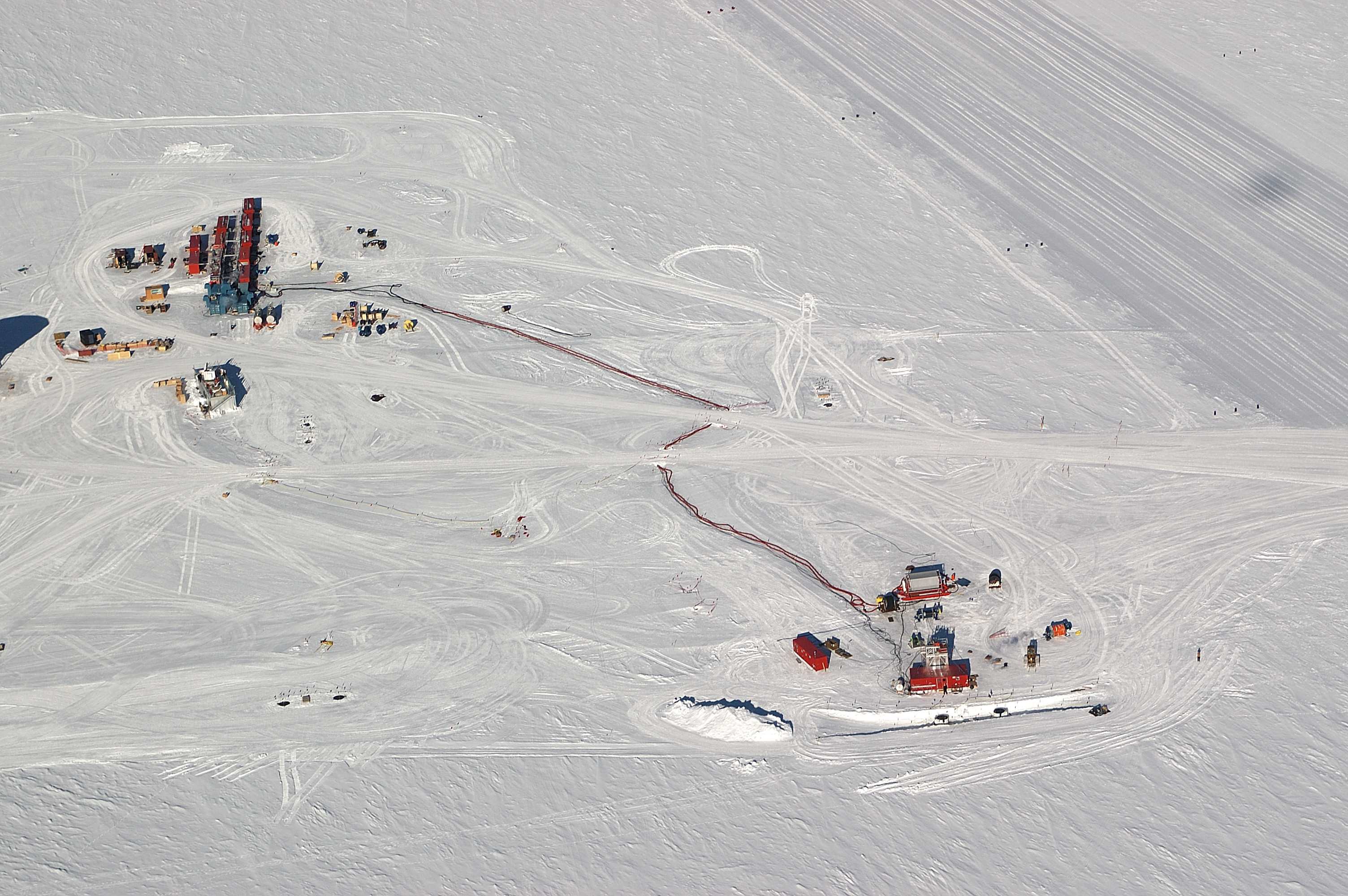 Aerial of buildings on snow.