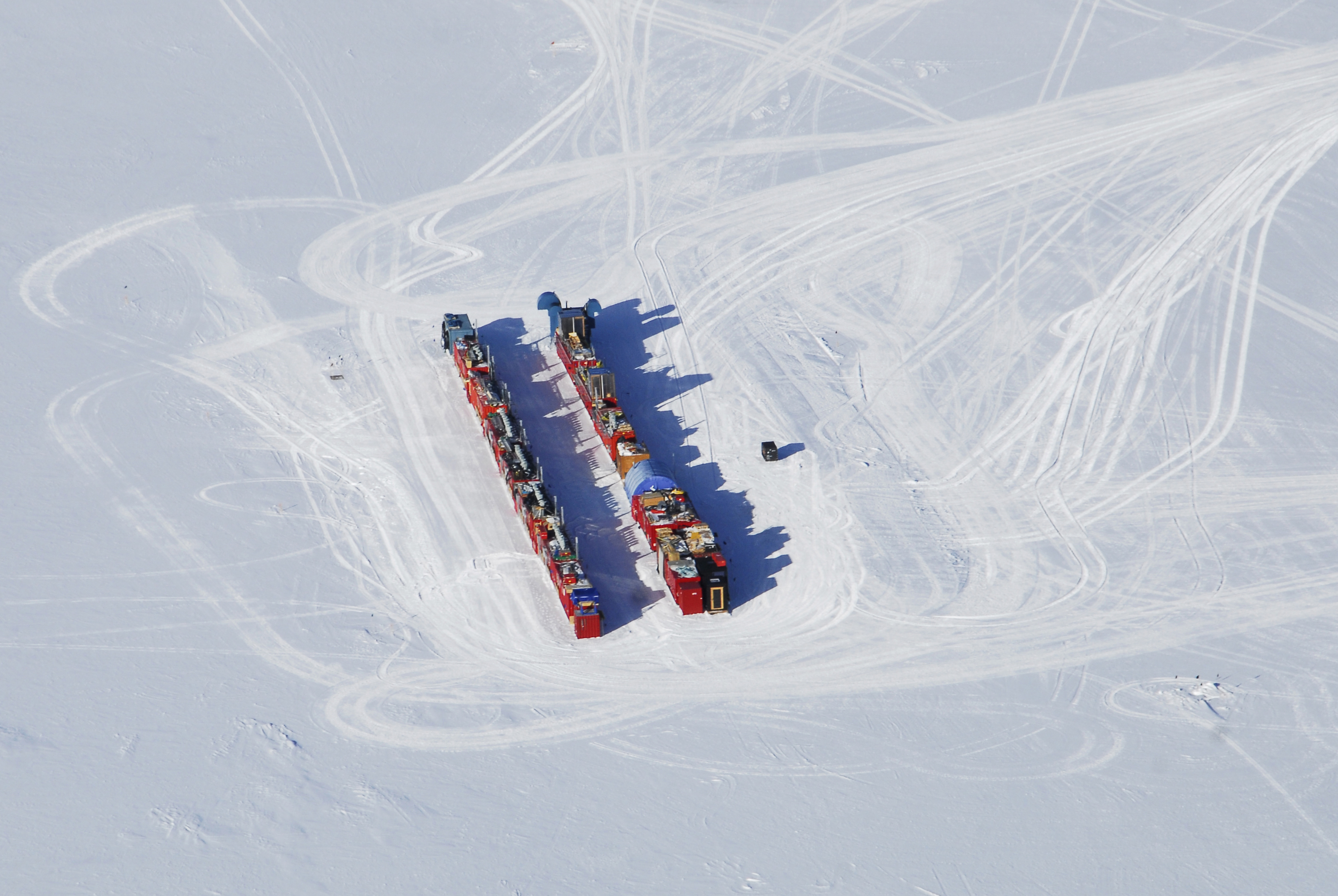 Aerial photo of buildings on snow.