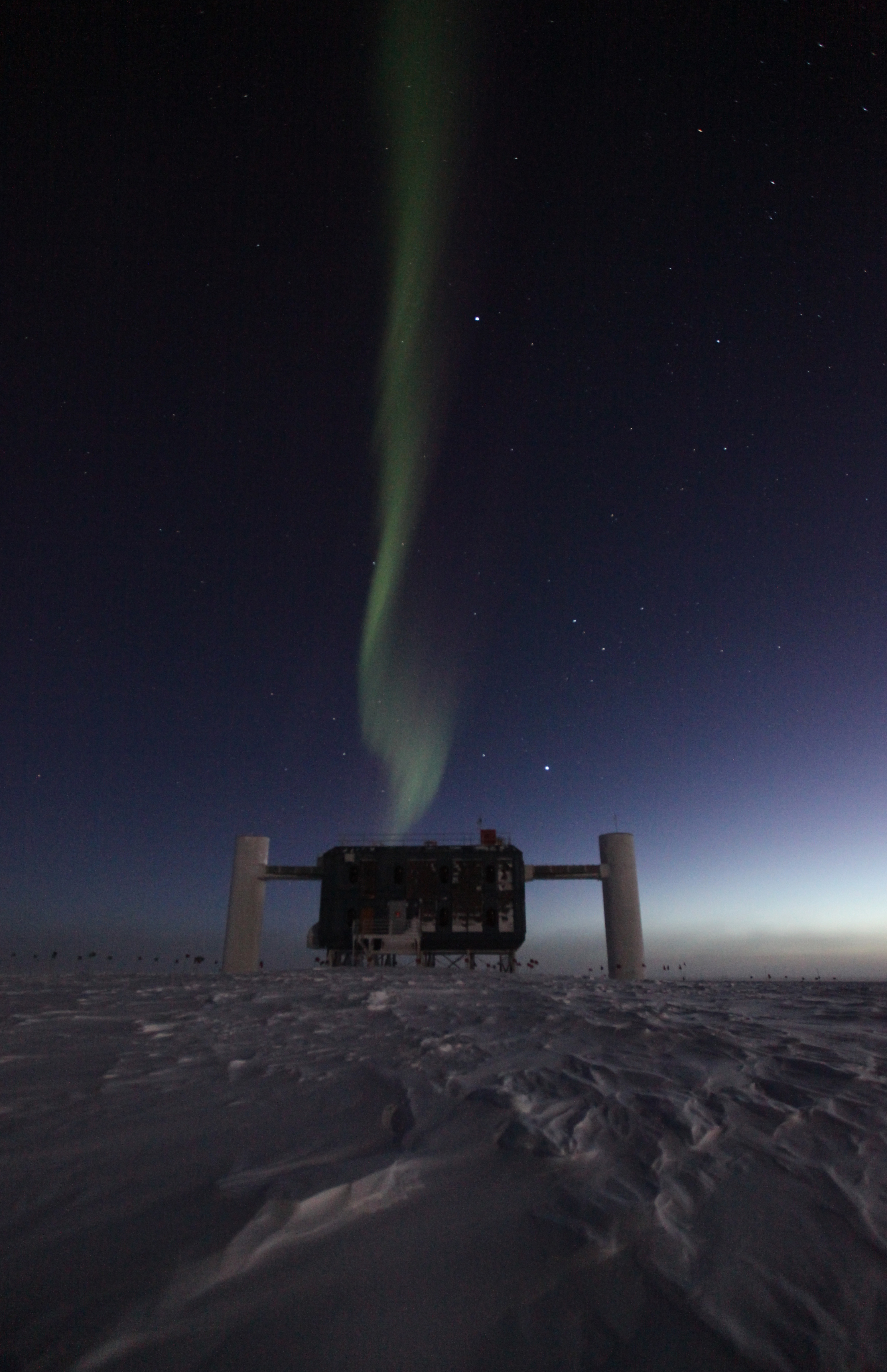 A building in the winter darkness.