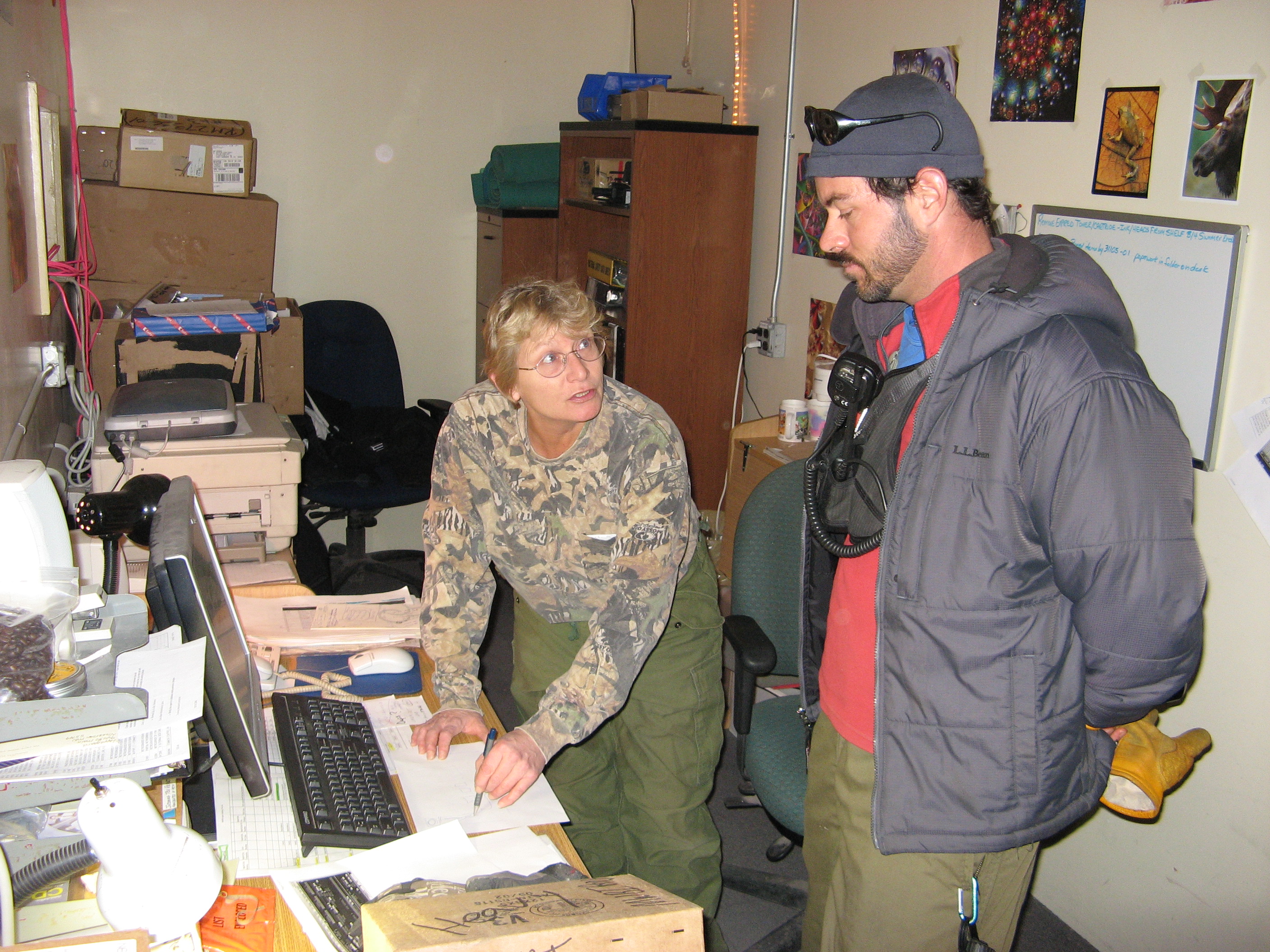 Two people in an office.