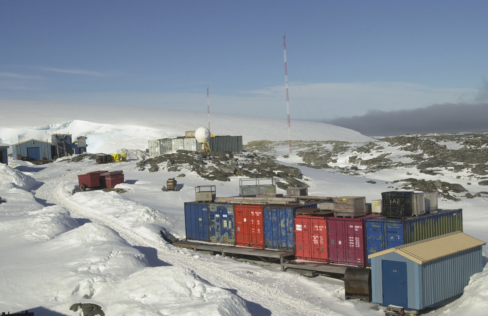 Row of shipping containers.