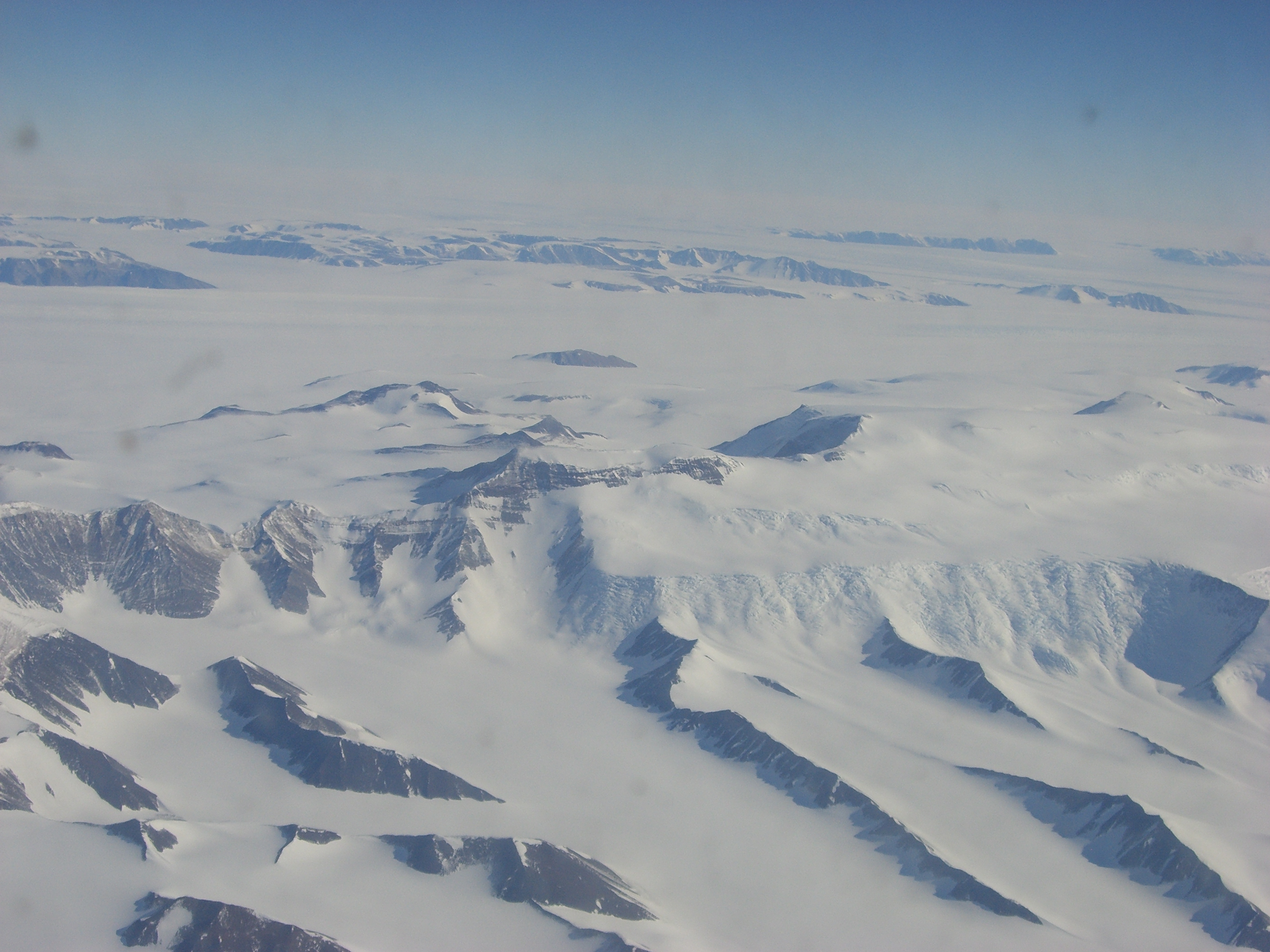 Aerial view of mountains and glaciers.