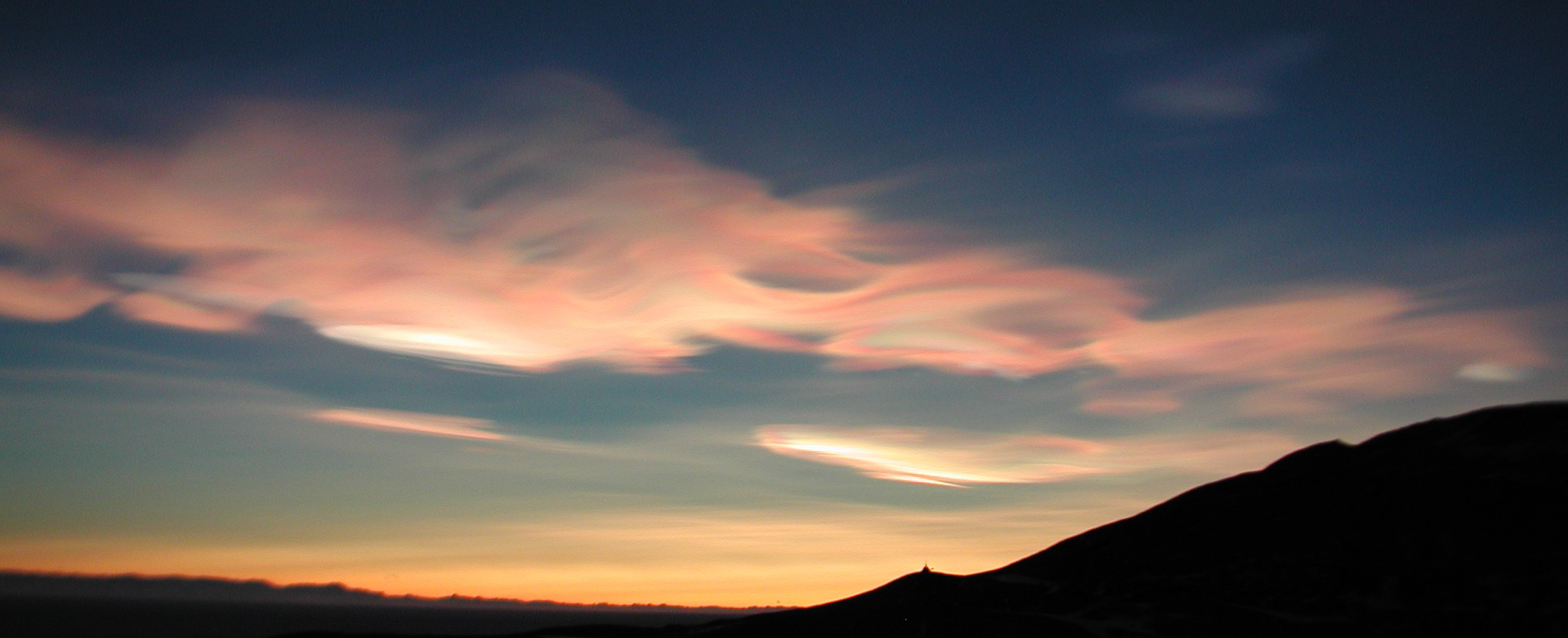 Colorful high stratus clouds.