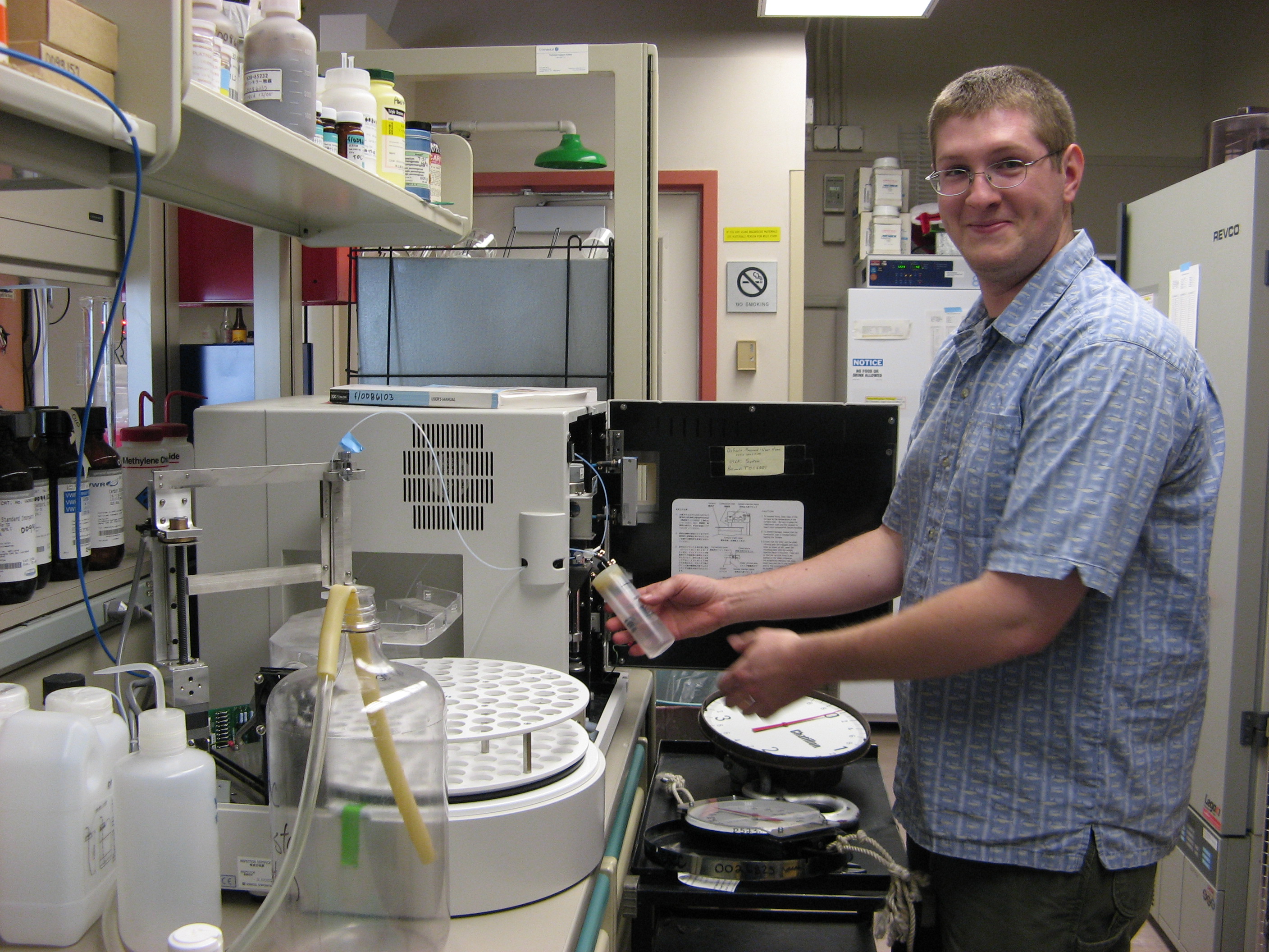 A man works in a science lab.