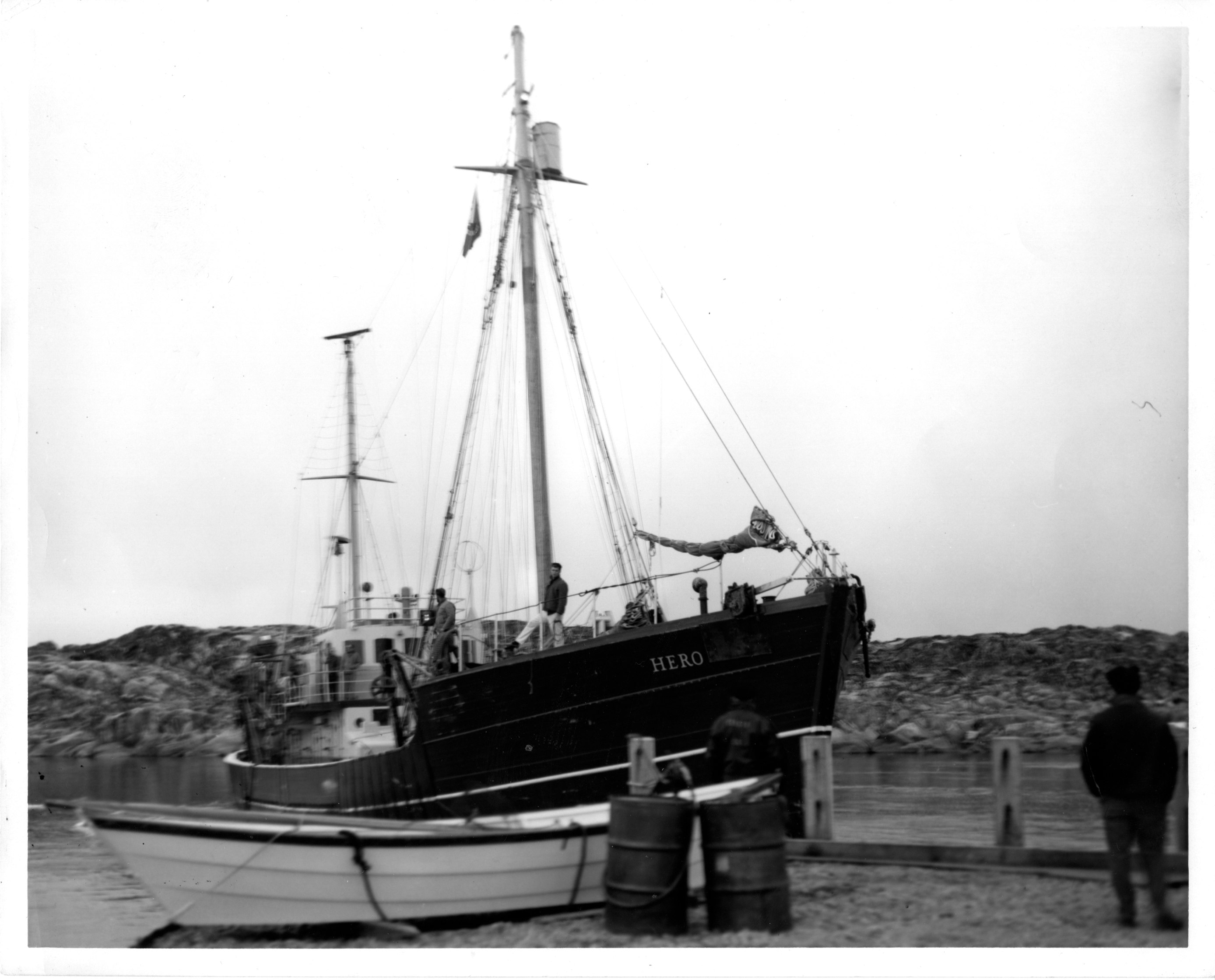 A boat docked near land.