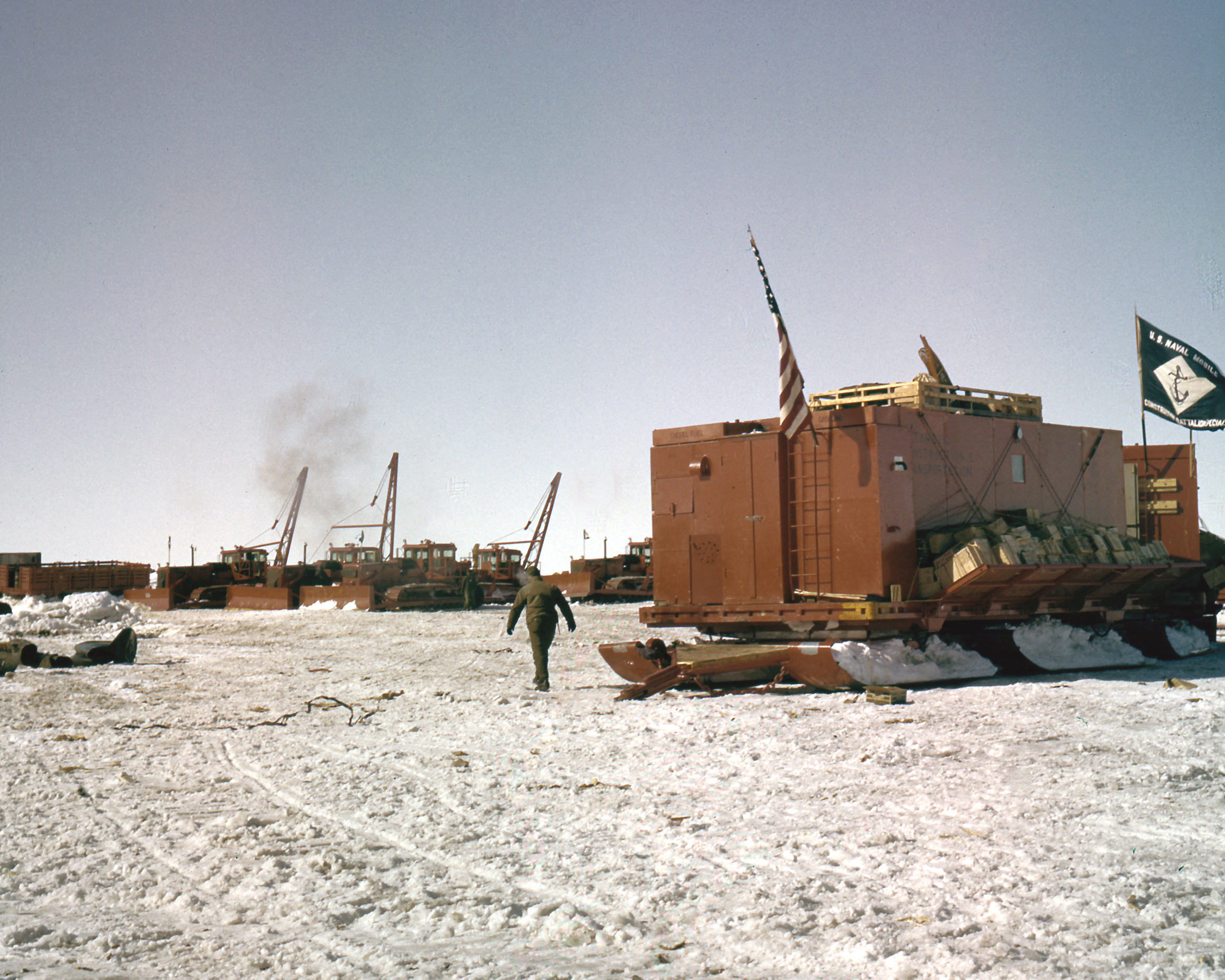 Heavy equipment on snow.