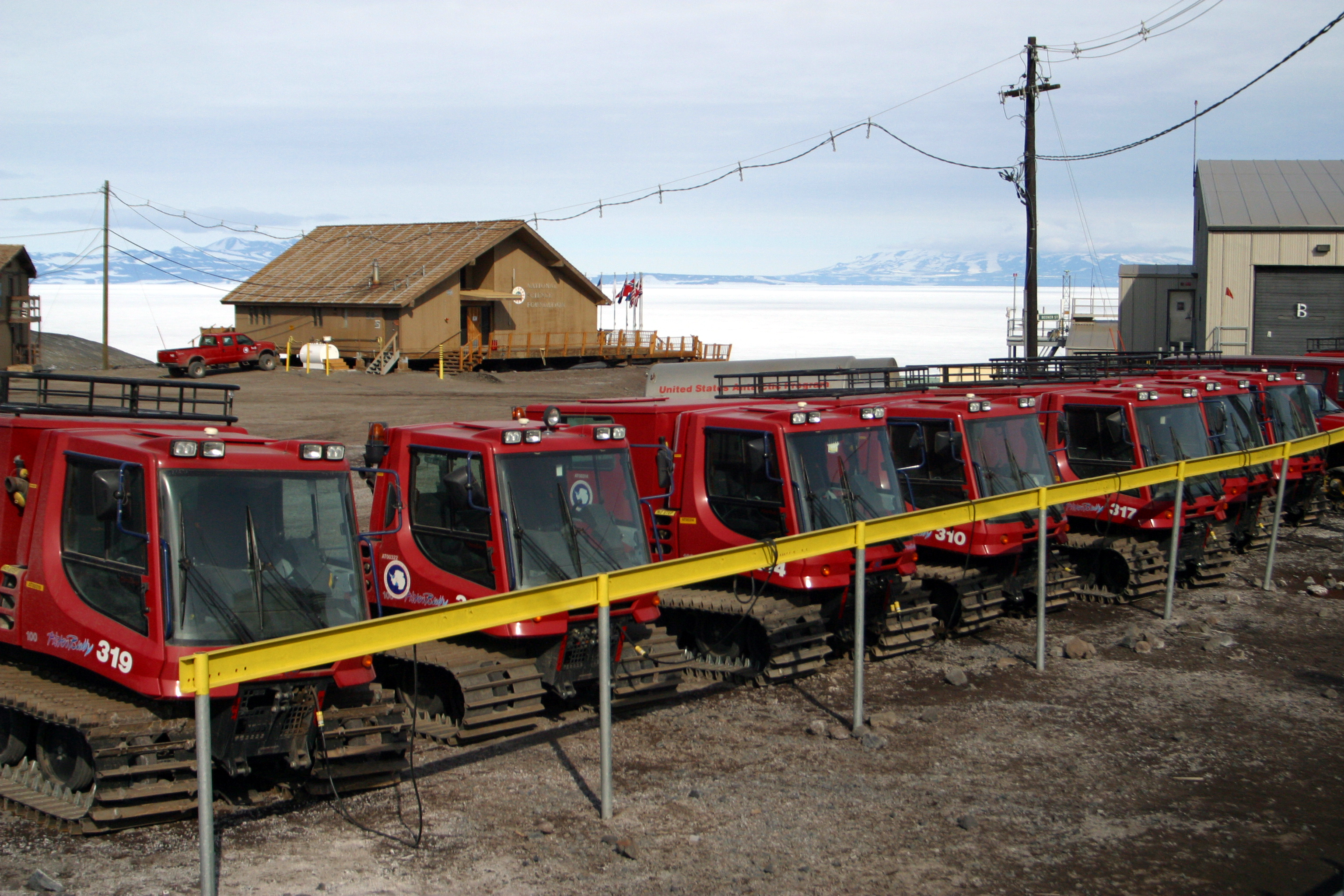 Tracked vehicles lined up.