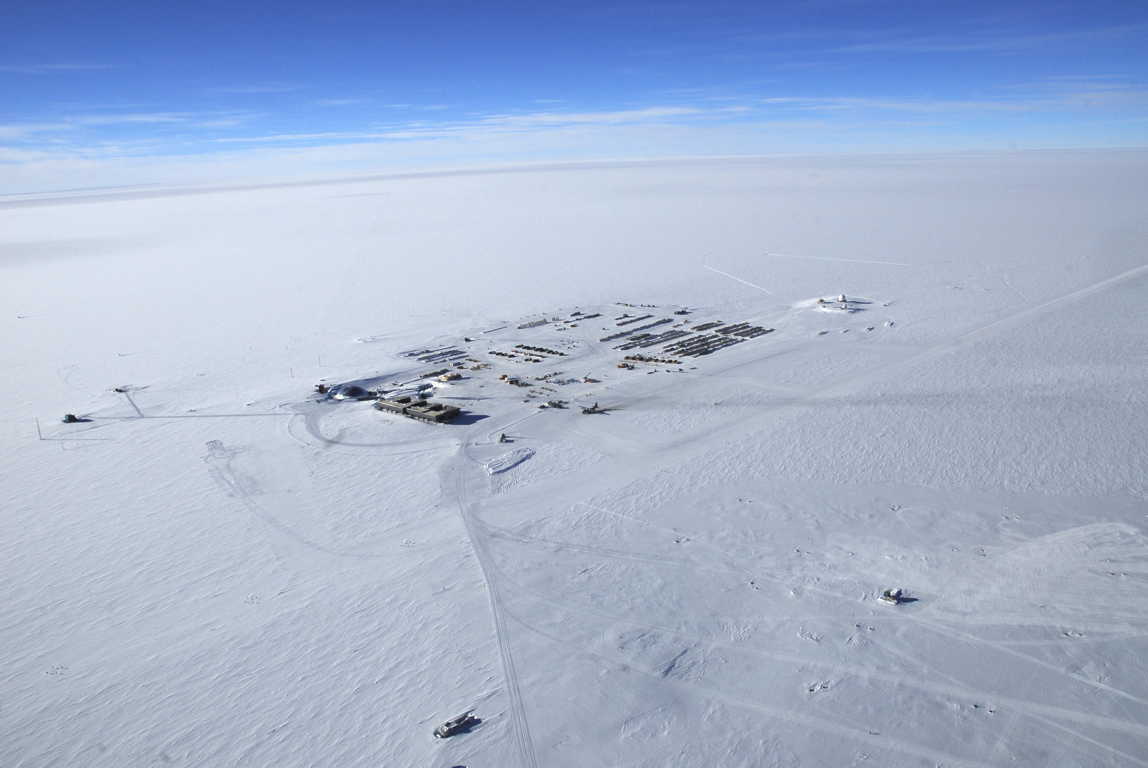 Aerial photo of buildings on snow.