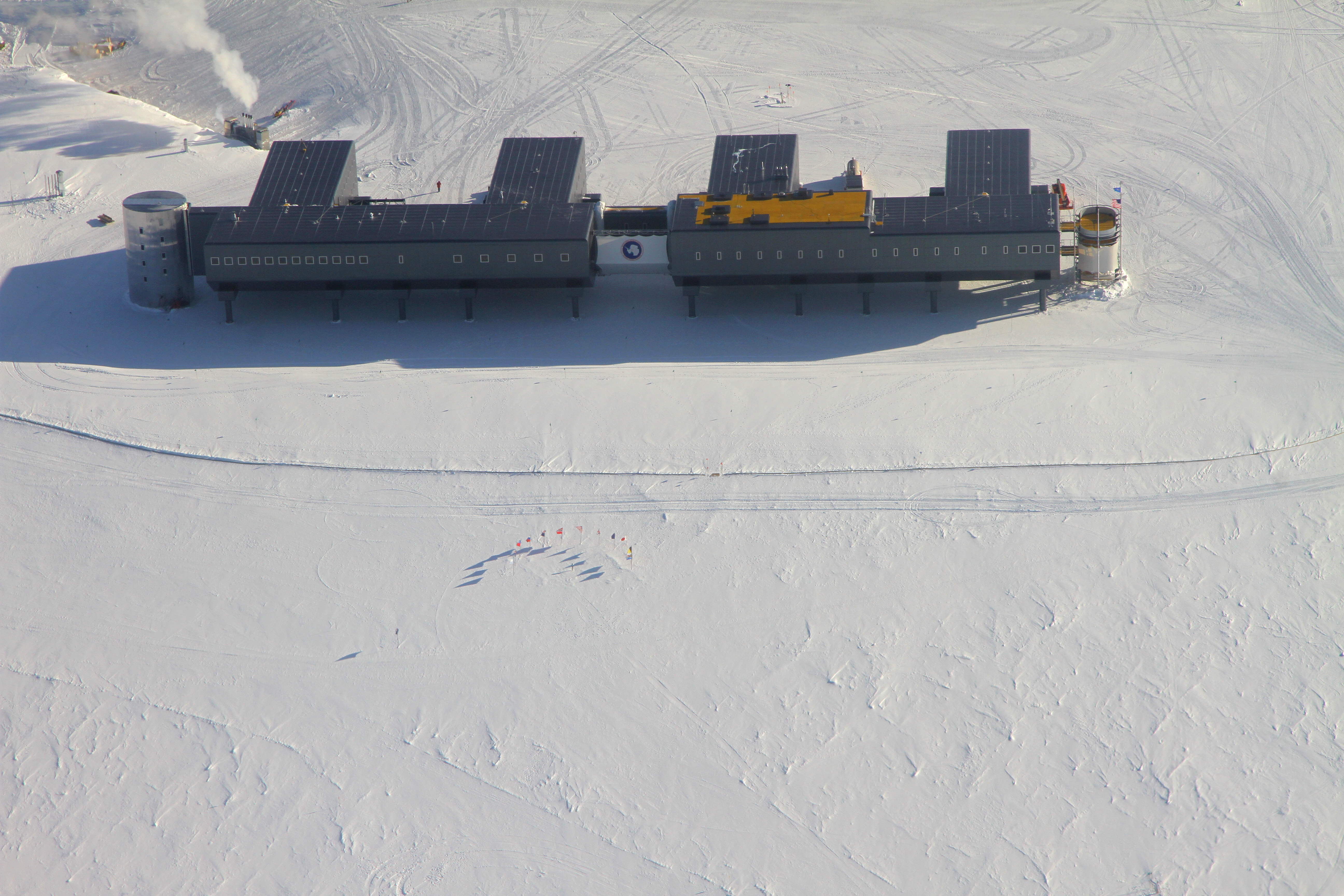 Aerial photo of buildings on snow.