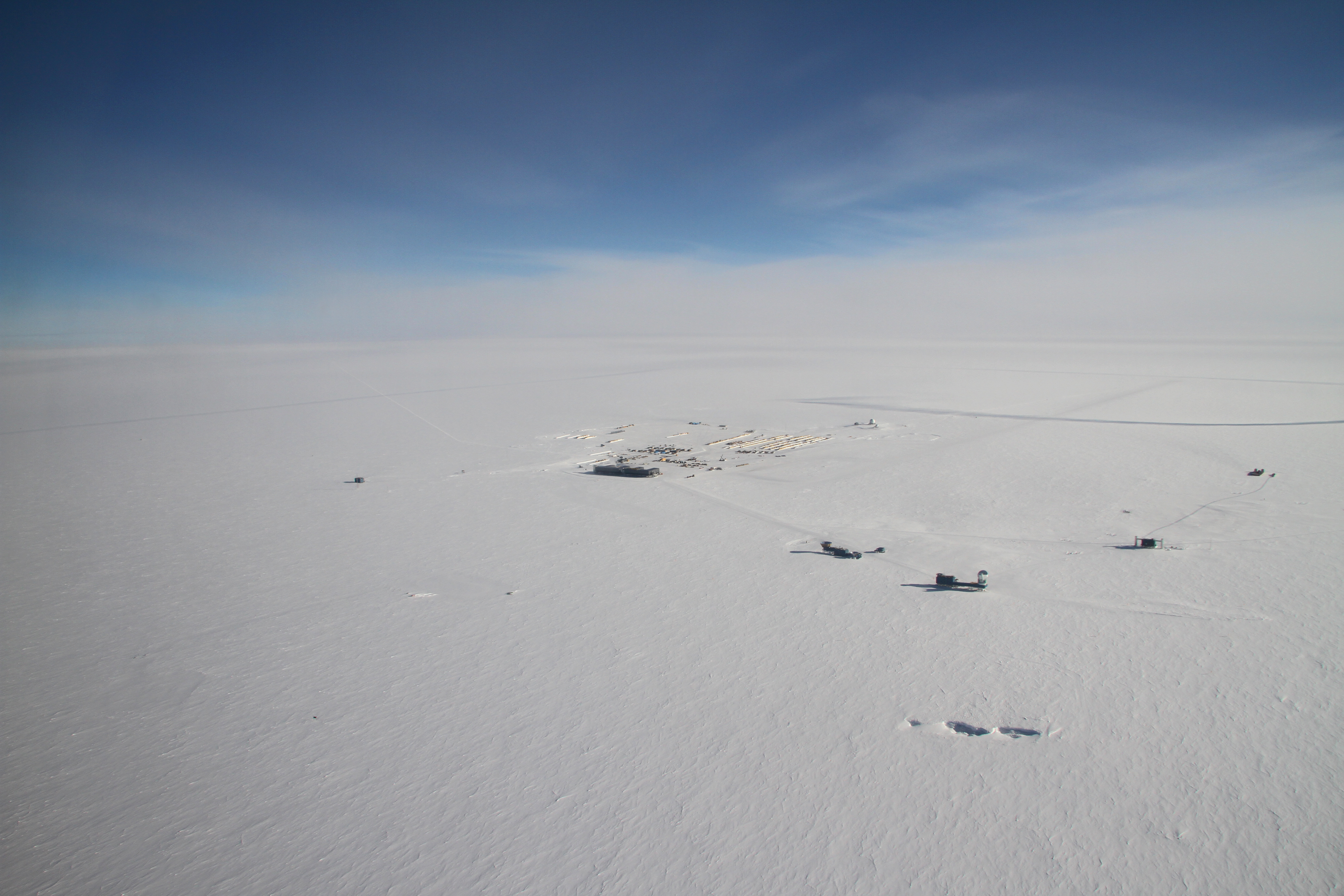 Aerial photo of buildings on snow.