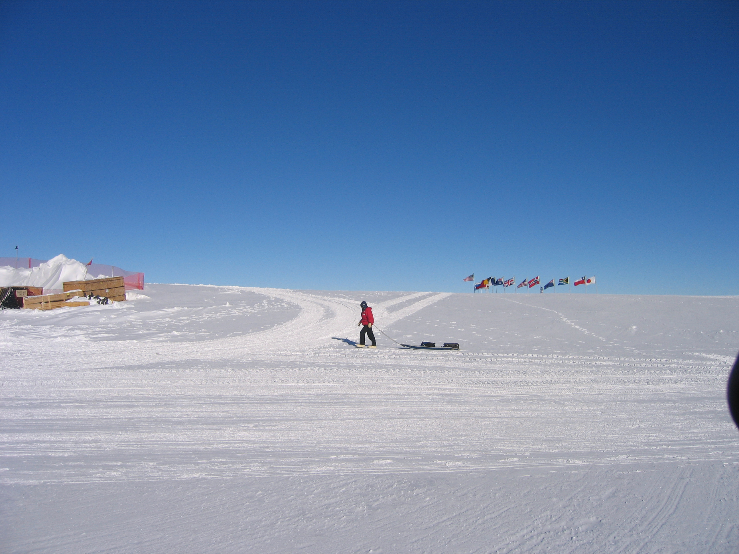 Person pulling sled.