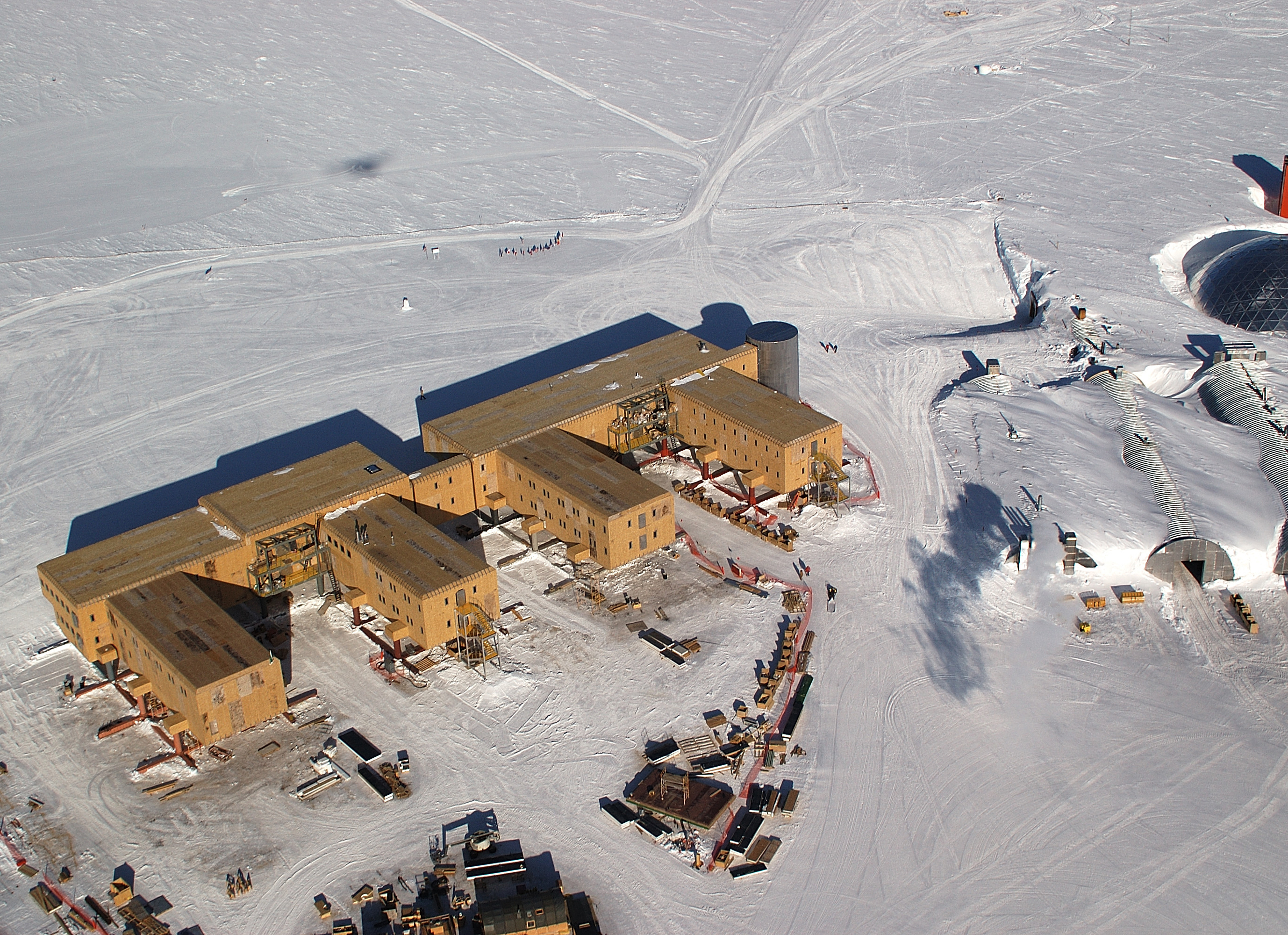 Aerial of buildings on snow.