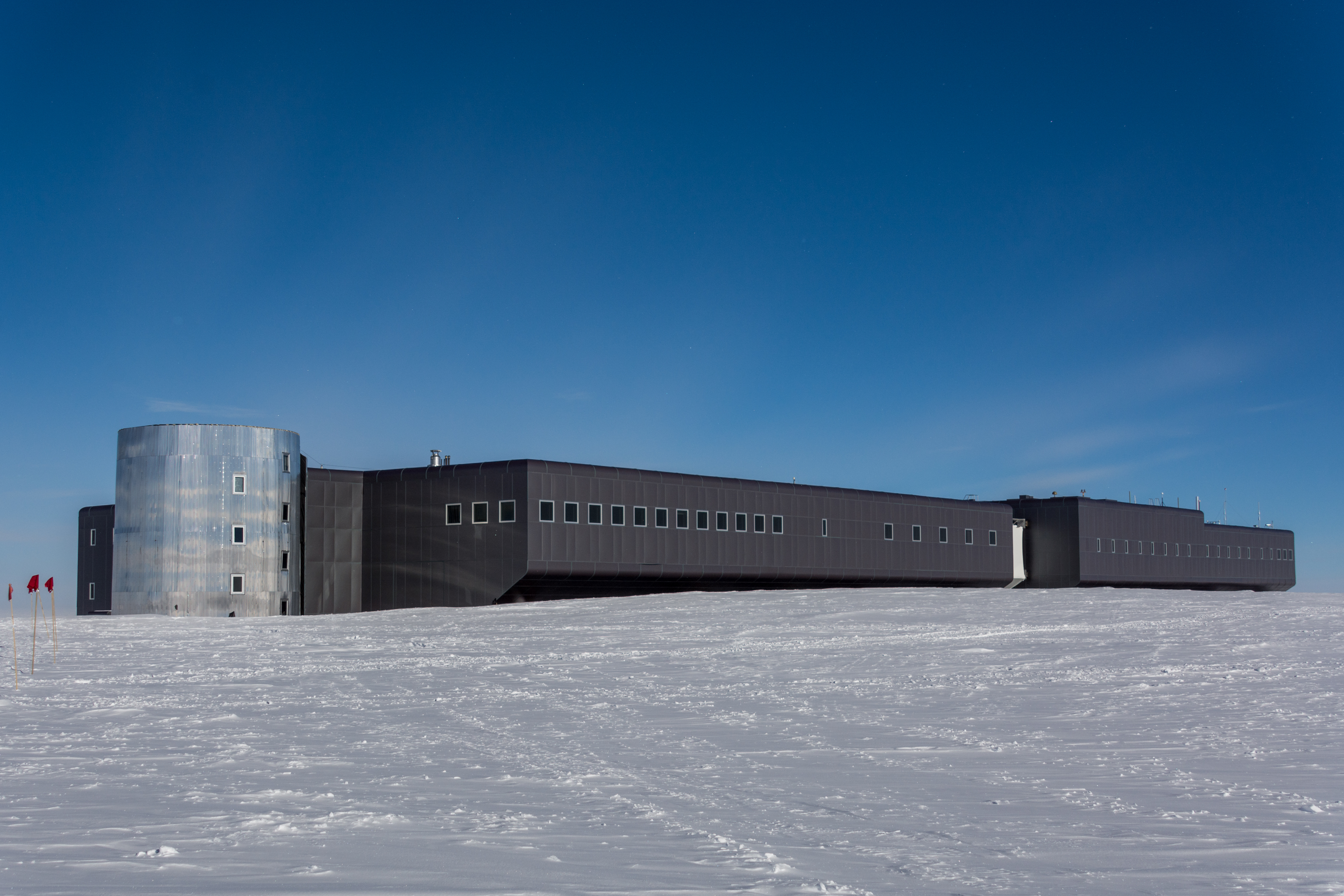 A building on a snowy landscape. 