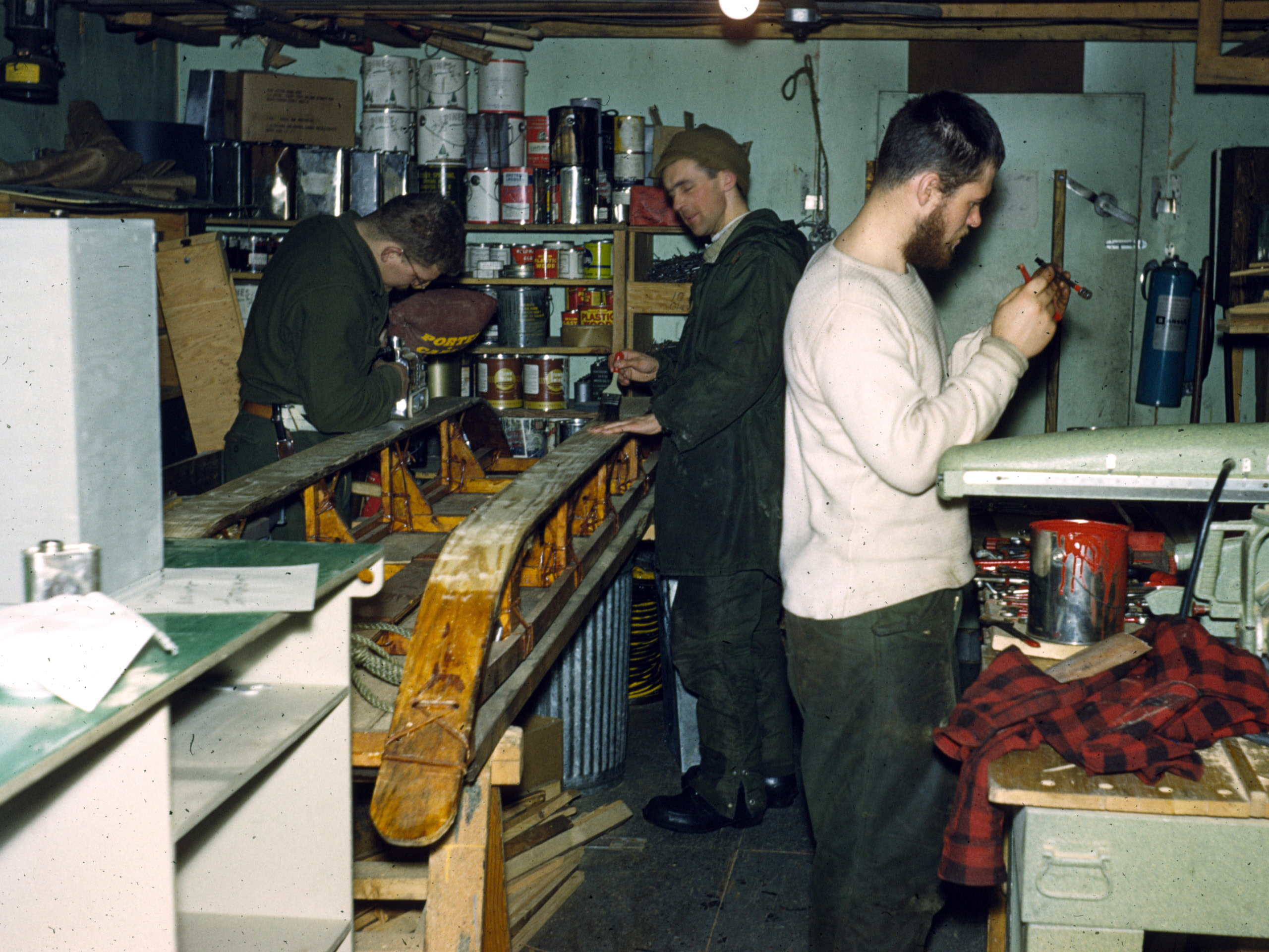 Men working in a shop.