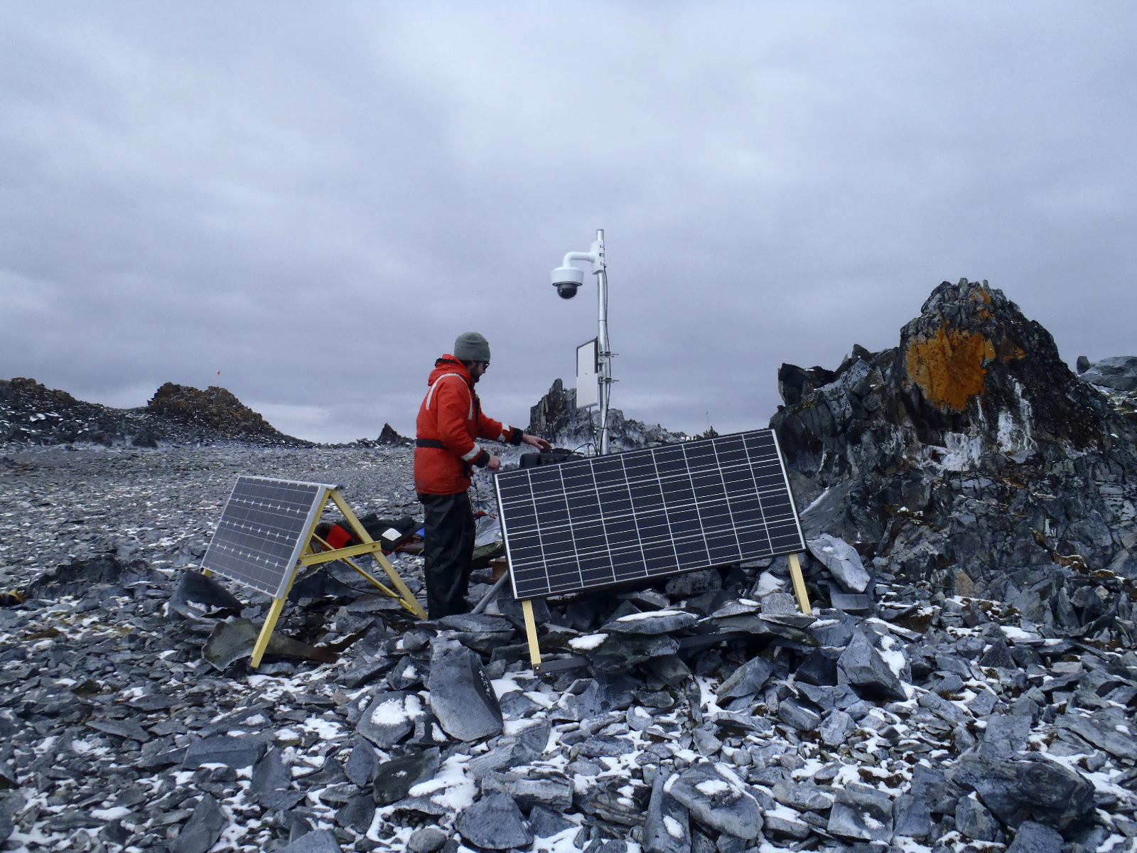A person near solar panels.