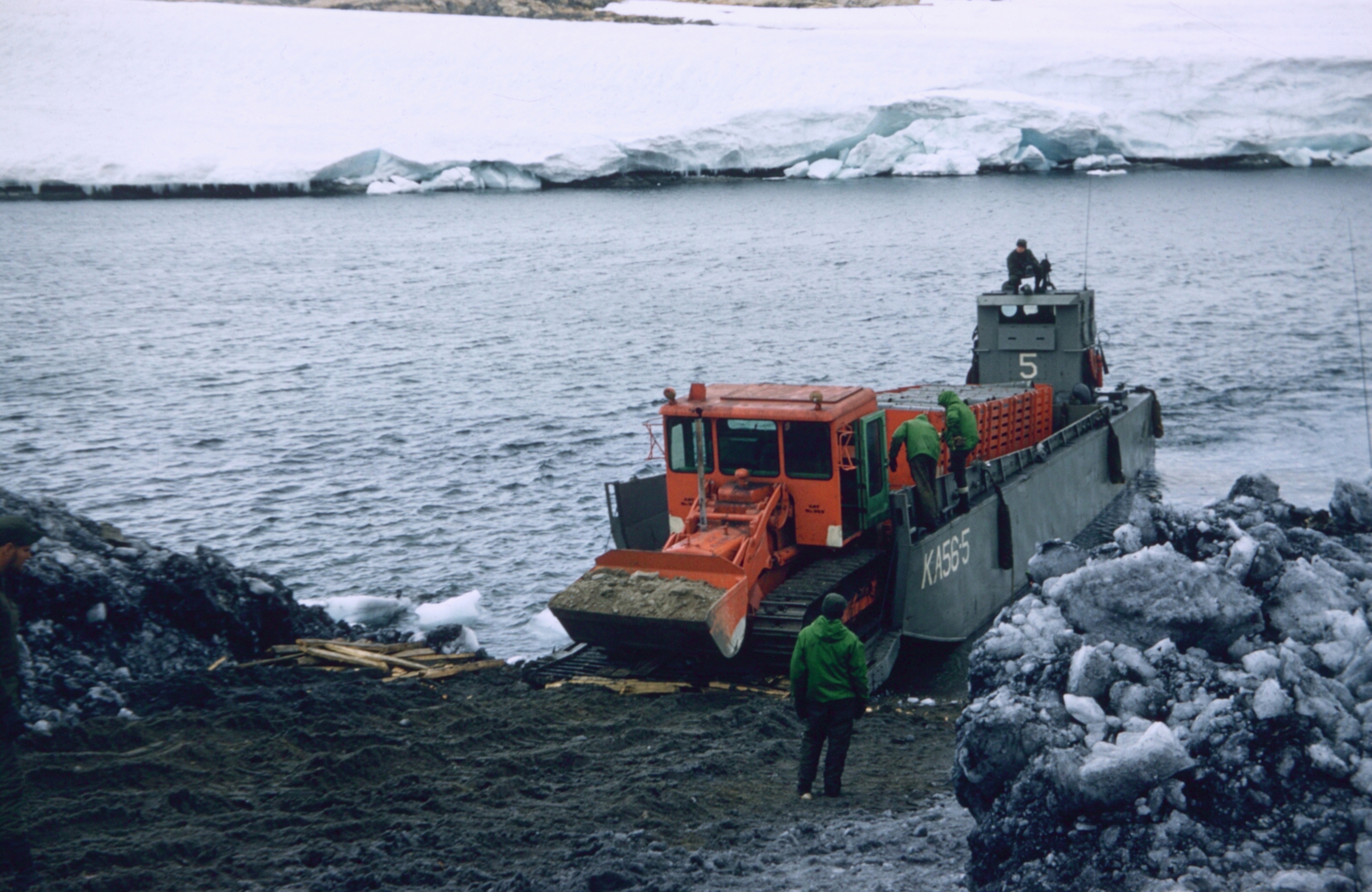 Vehicle on shoreline.