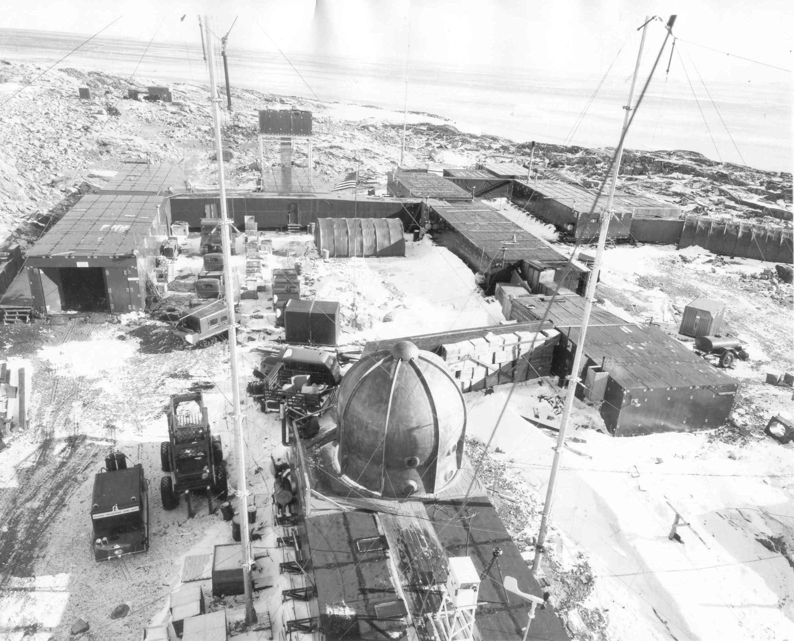 Aerial view of buildings on snow.