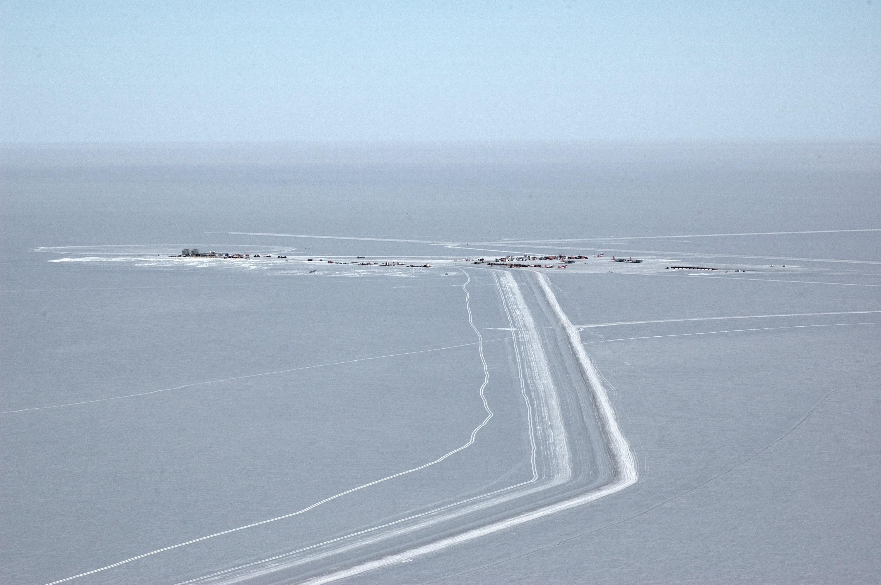 Aerial view of buildings on snow.