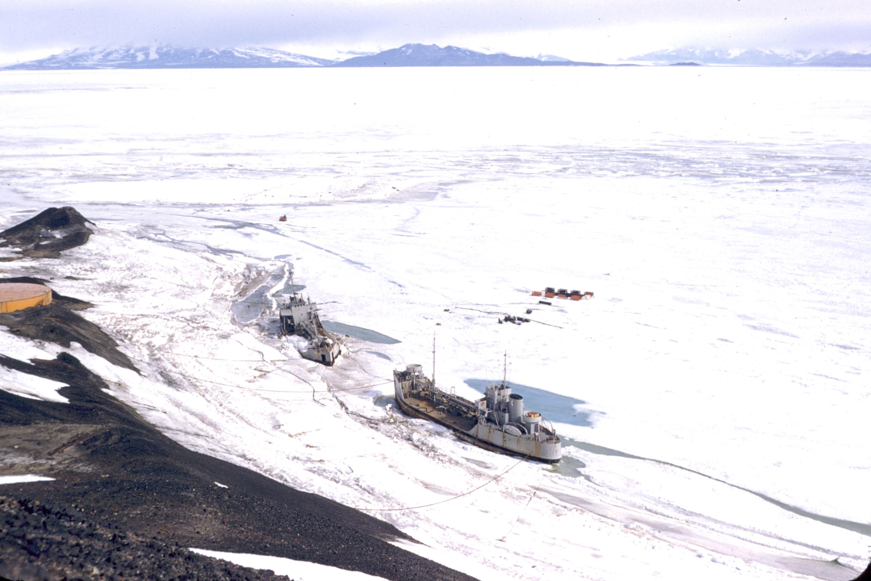 Two ships frozen in water.