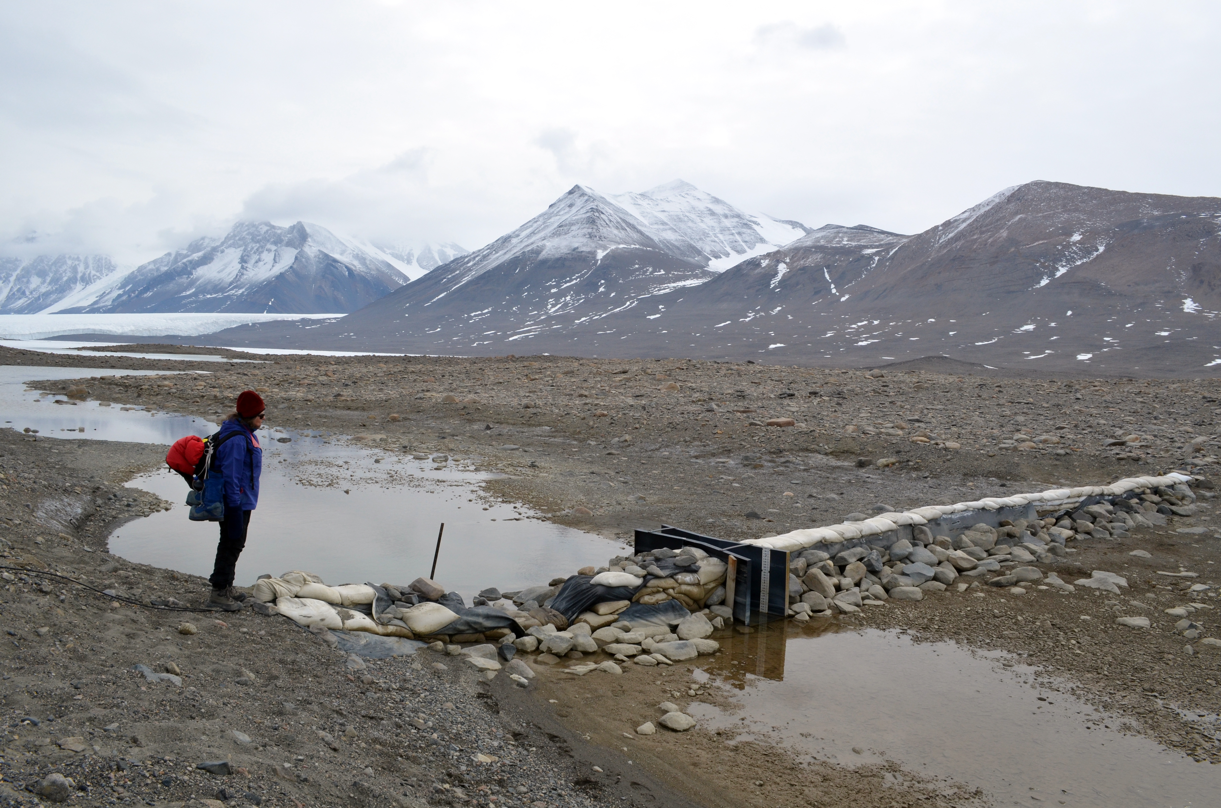 A person near a small body of water.