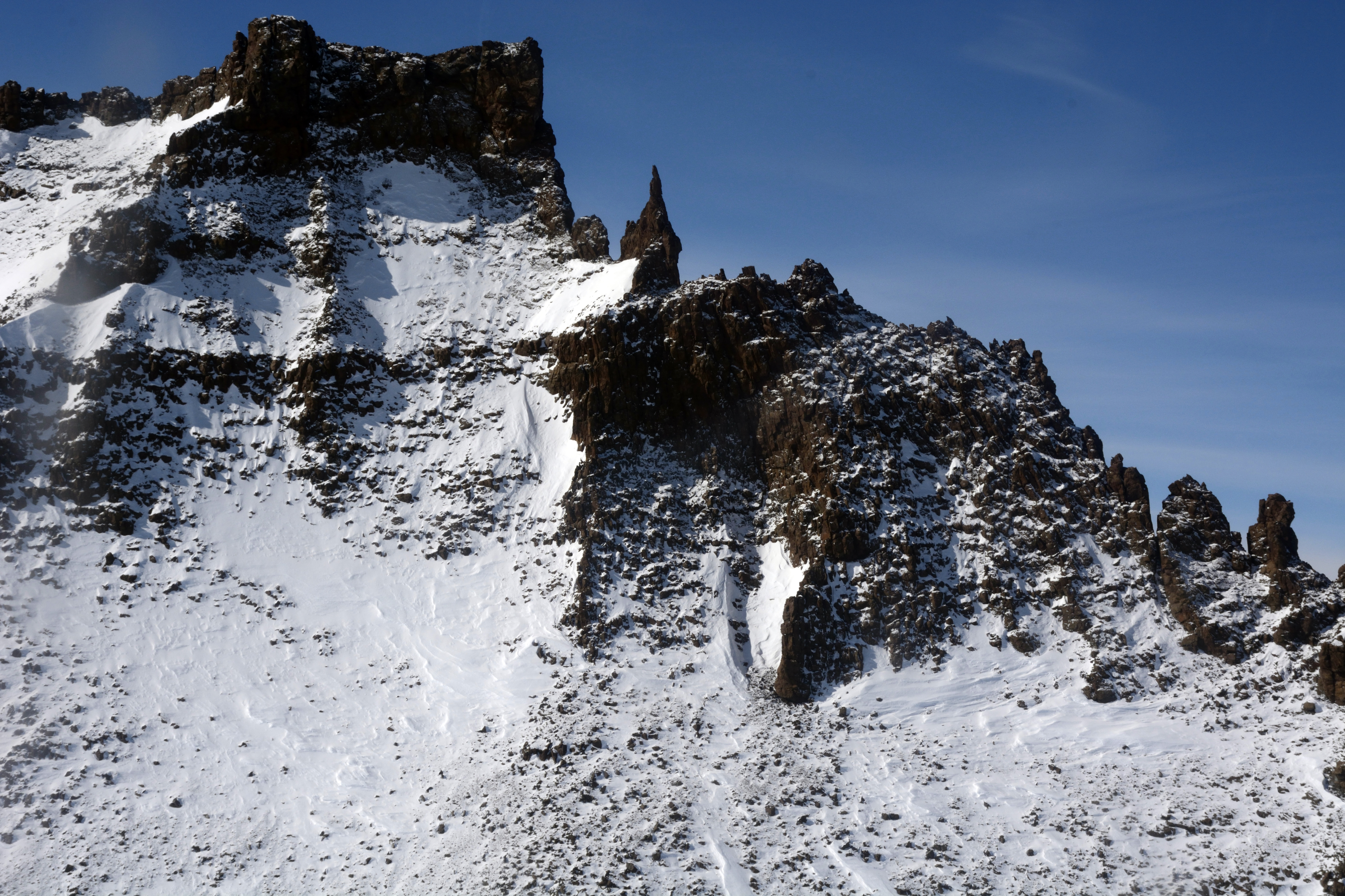 Aerial view of glaciated mountain range.