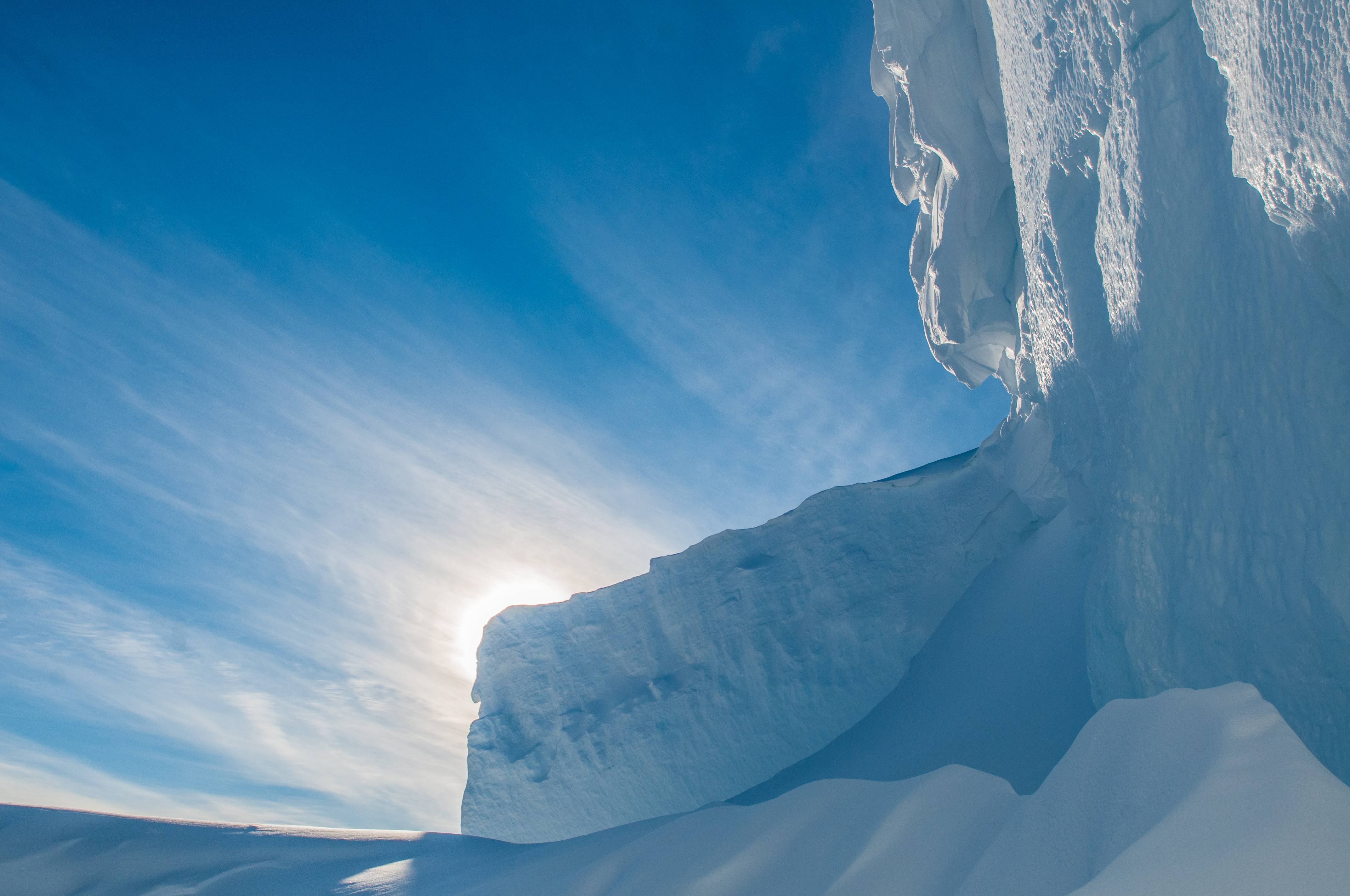 Sun behind ice creates dramatic effect.
