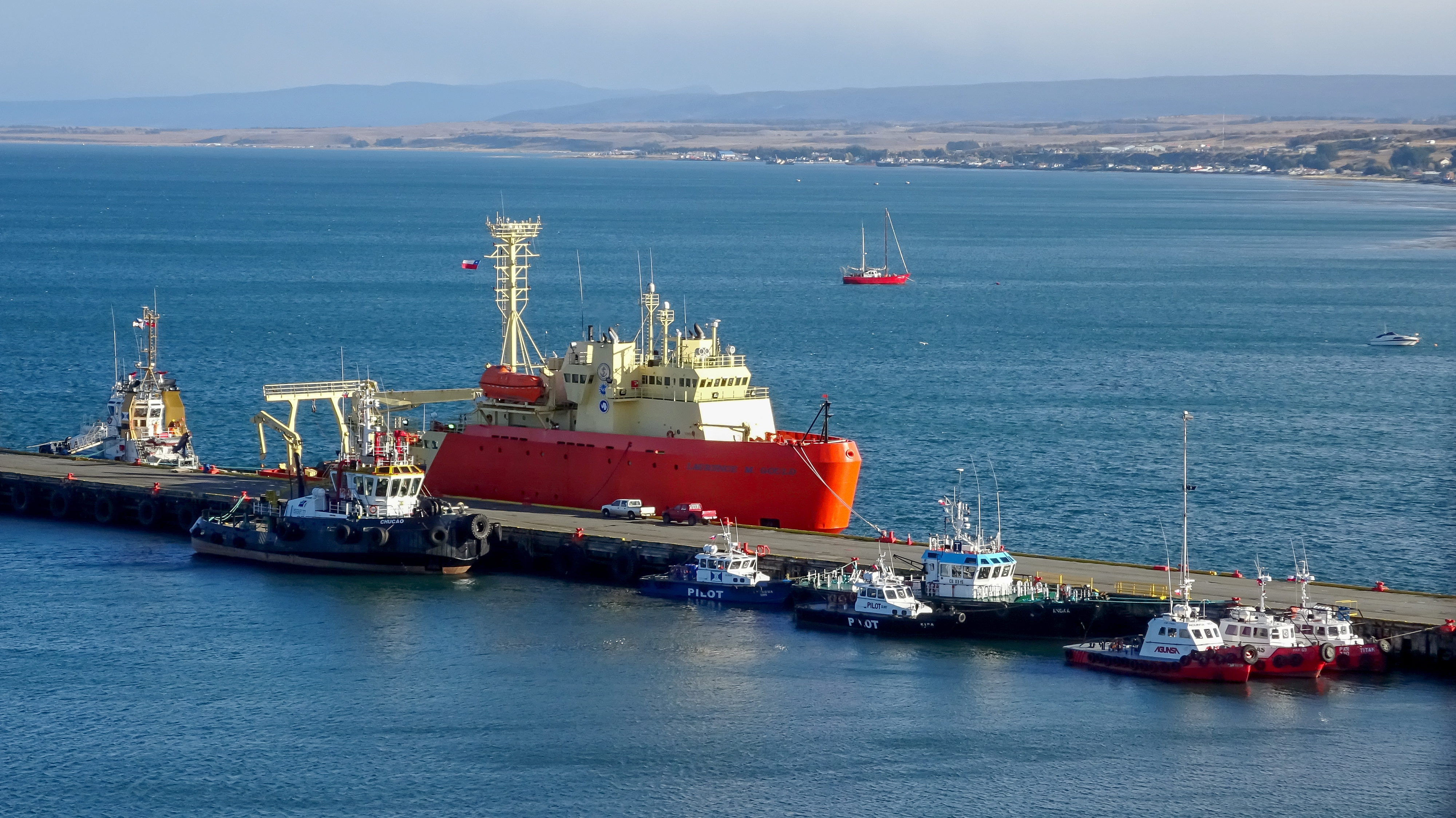 A vessel docked at a pier.