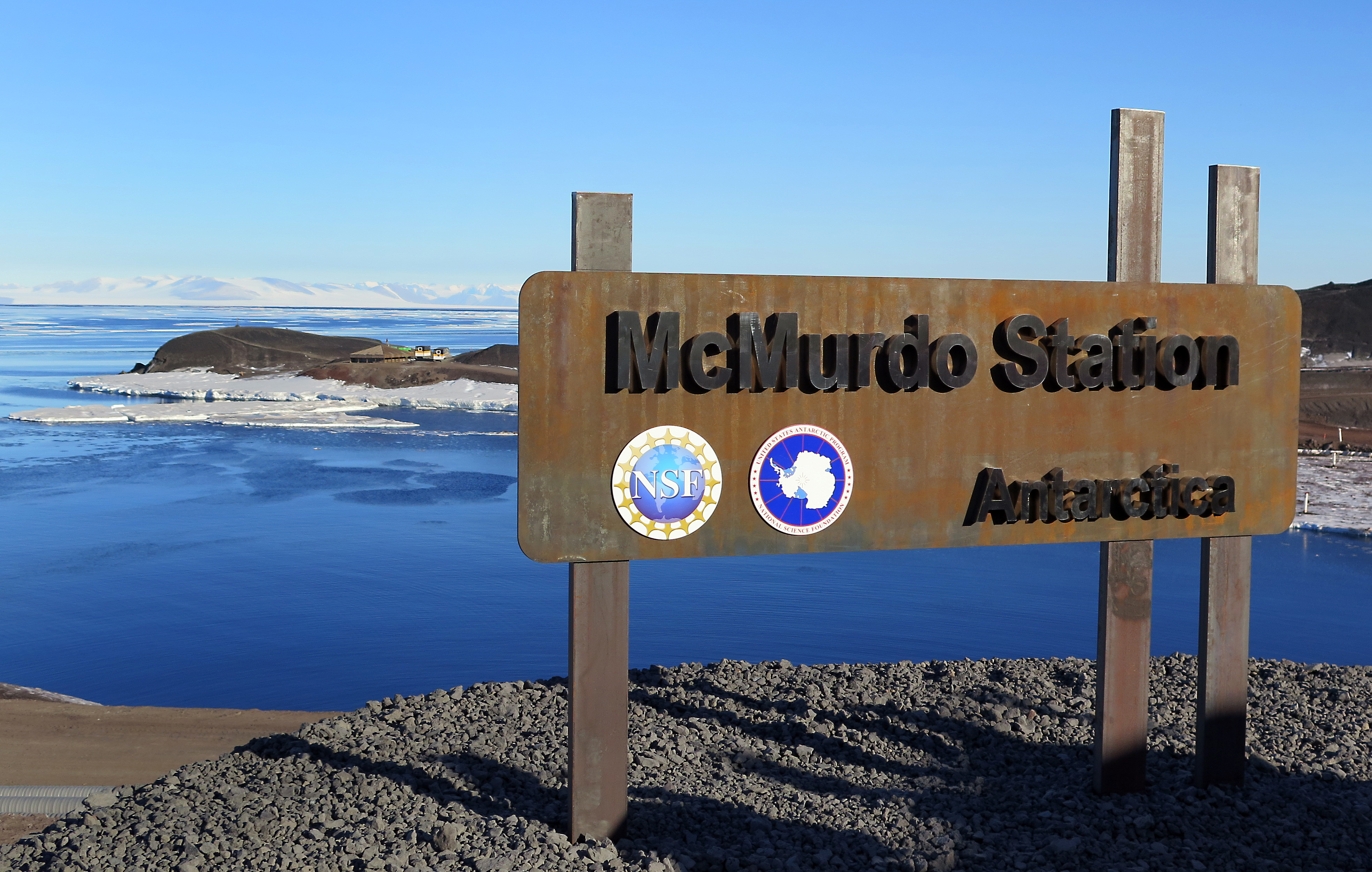 A sign near a coastline.