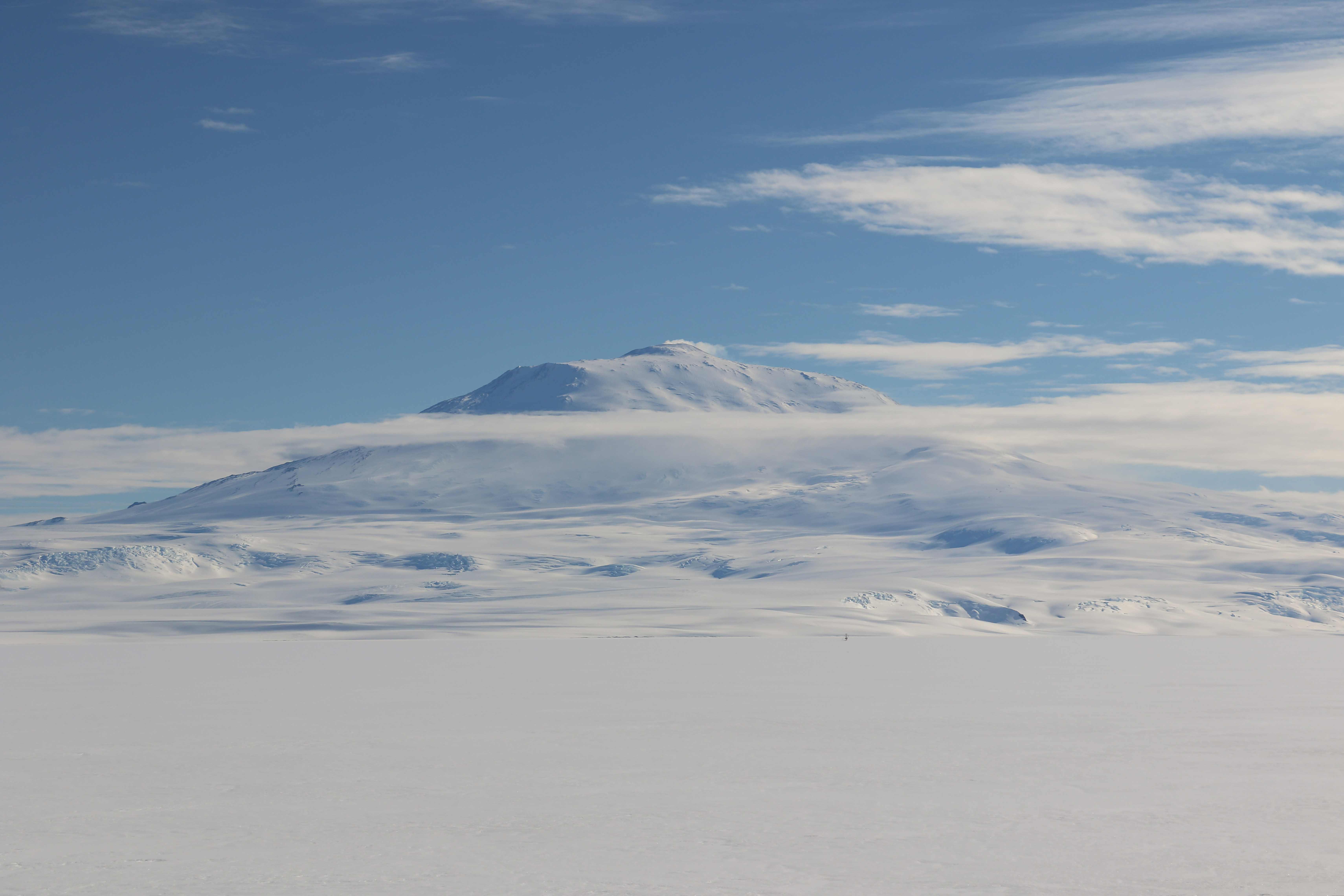 A snow covered mountain.
