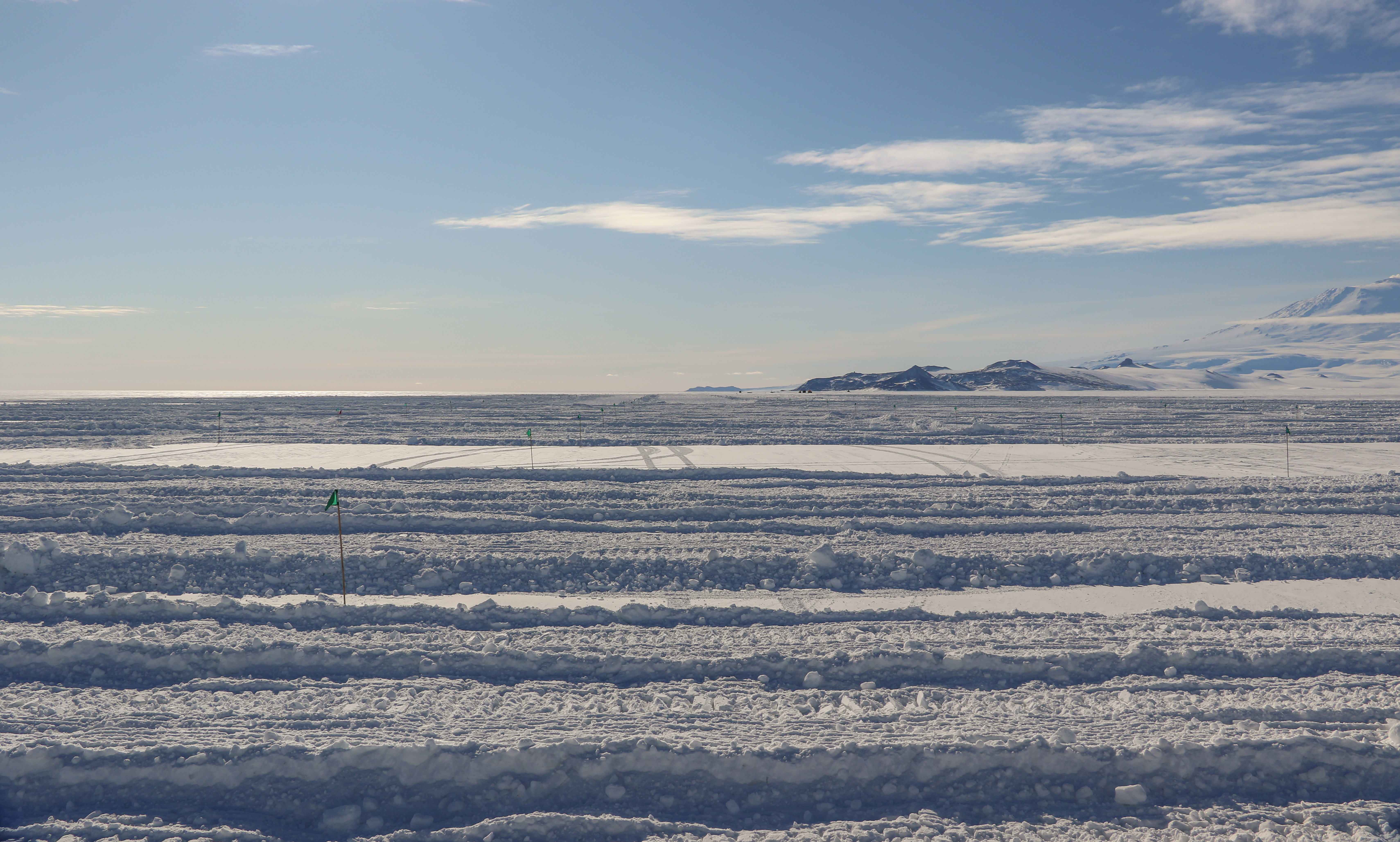 Vehicle tracks in the snow.
