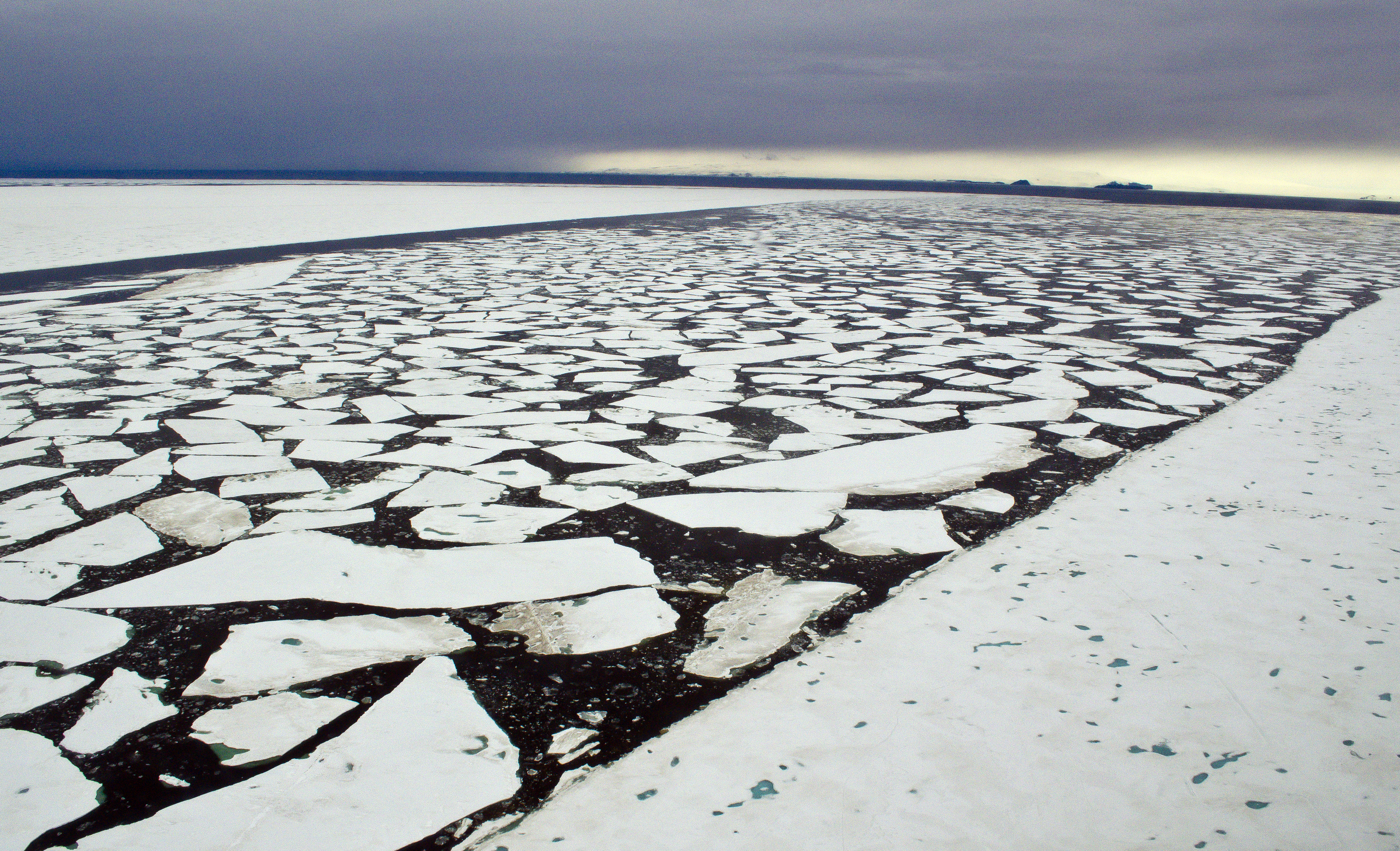 Ice fills a channe of water.