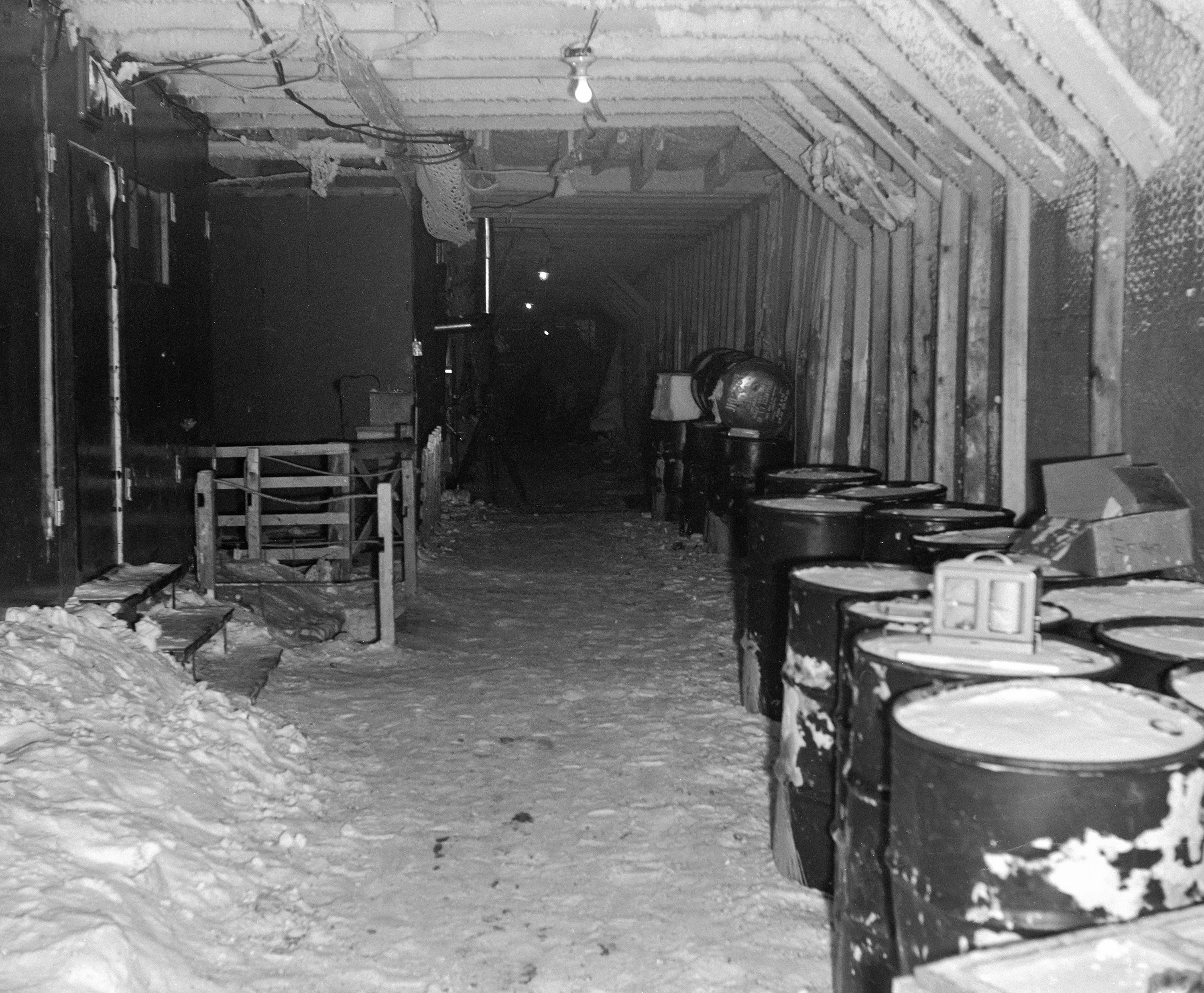 A black and white photo of a storage area.