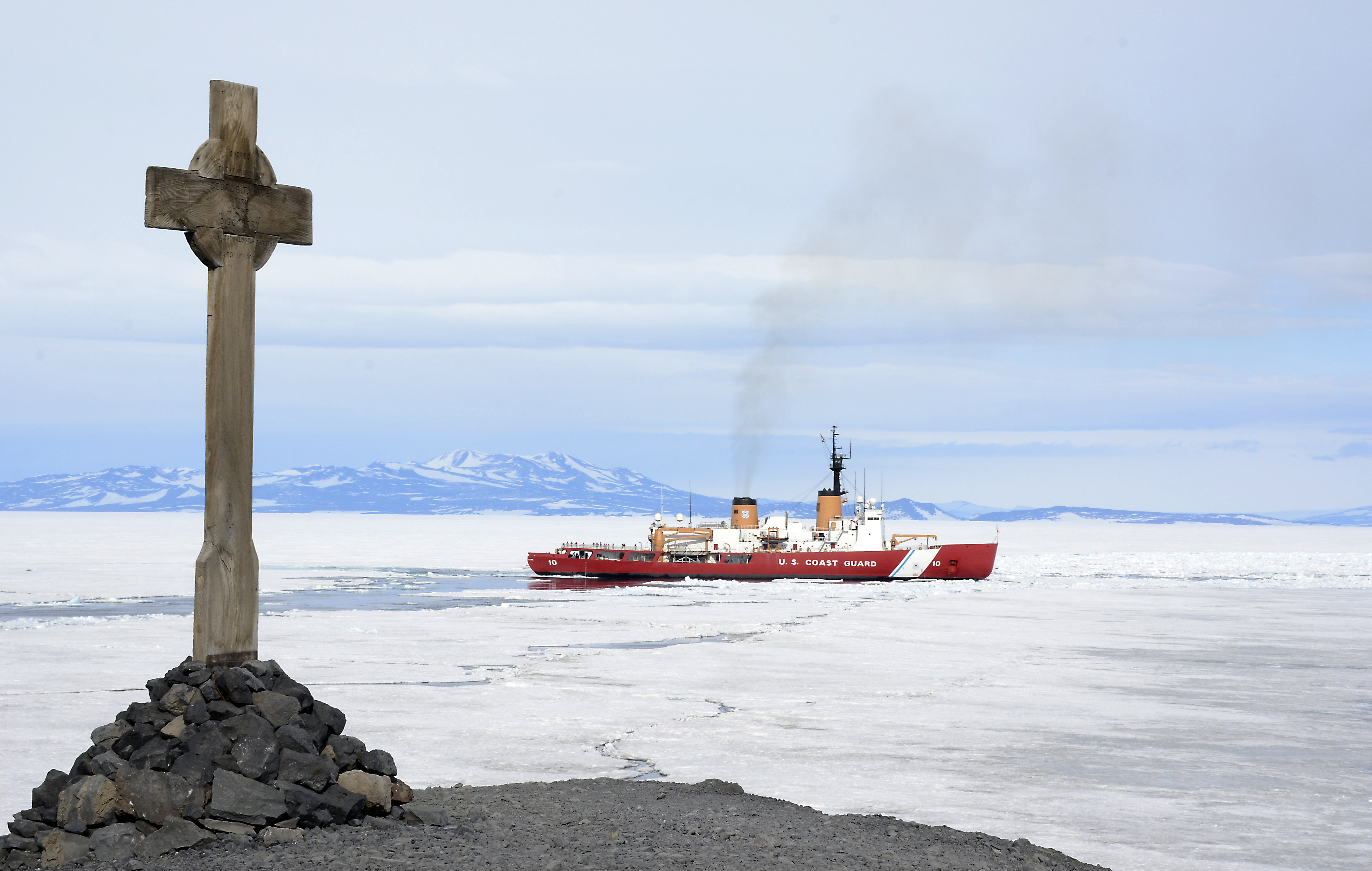 Ship passes a cross.