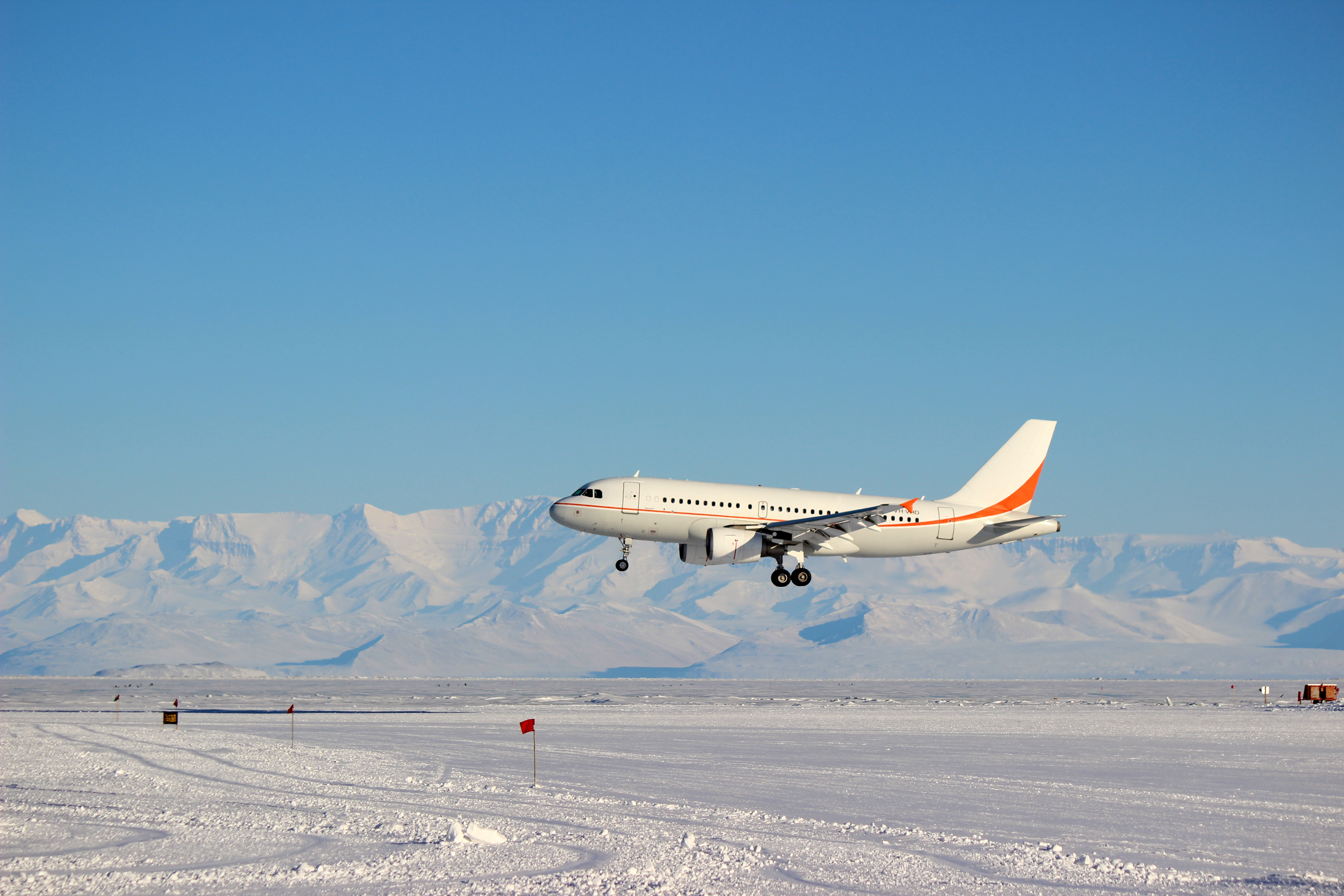 A jet lands on ice.